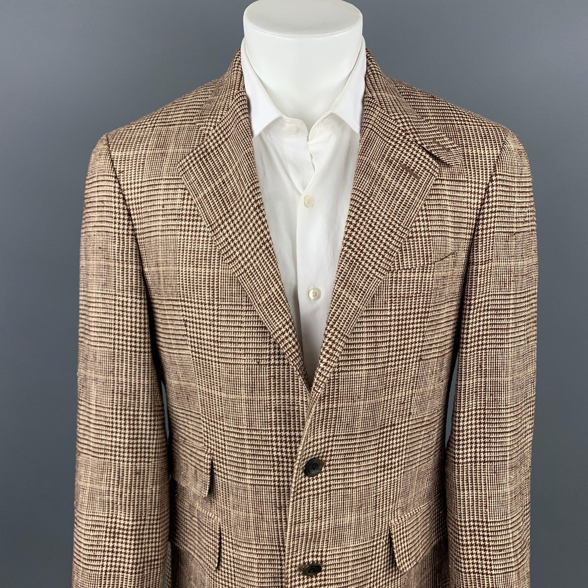 ETRO sport coat comes in a brown & beige plaid silk / linen with a full print liner featuring a notch lapel, flap pockets, and a three button closure. Made in Italy.Very Good
Pre-Owned Condition. 

Marked:   IT 50 

Measurements: 
 
Shoulder:Chest: