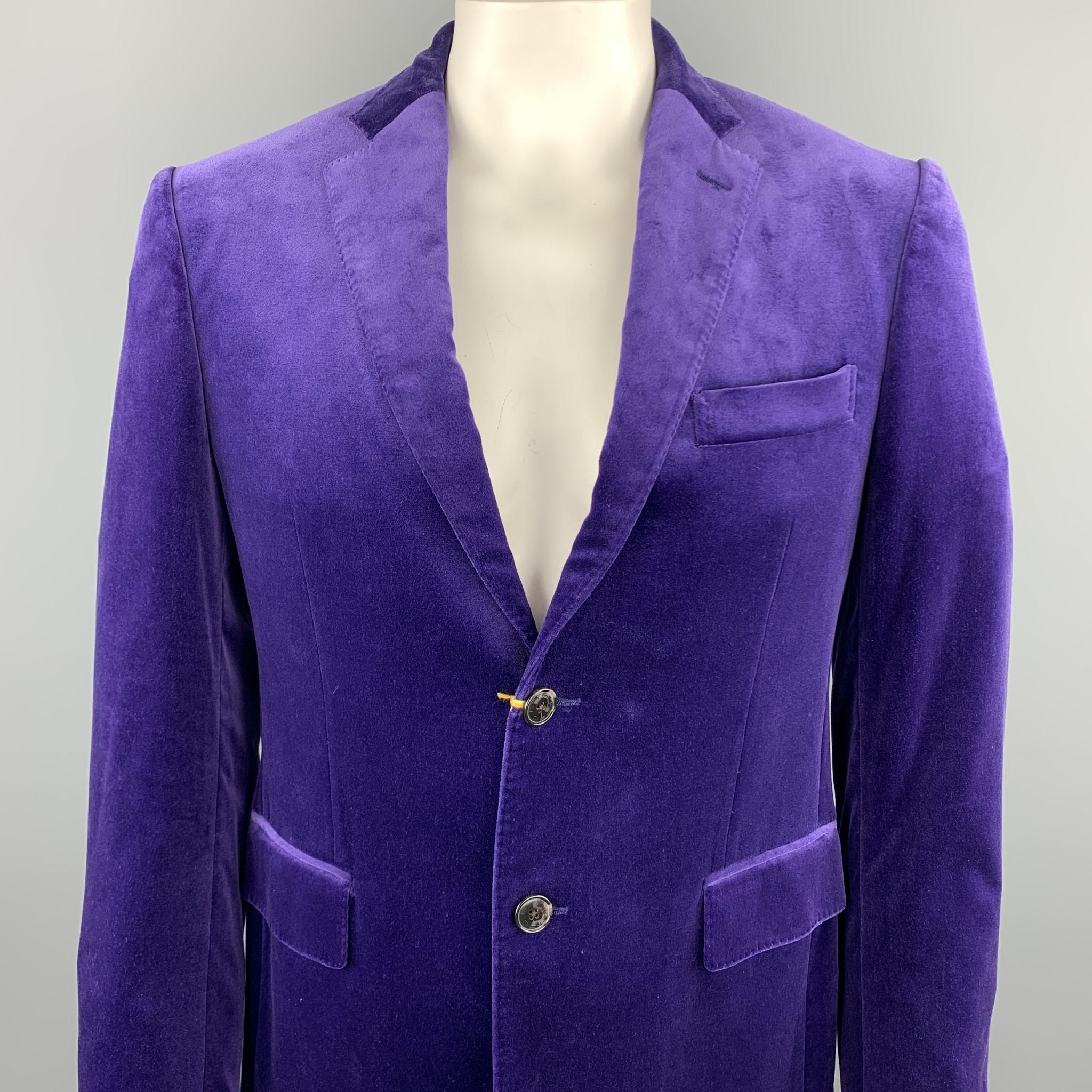 Retailed for: $1,495.00. ETRO sport coat comes in a purple velvet featuring a notch lapel style, flap pockets, and a two button closure. Made in Italy.

New With Tags.
Marked: IT 50

Measurements:

Shoulder: 19 in. 
Chest: 40 in. 
Sleeve: 26 in.