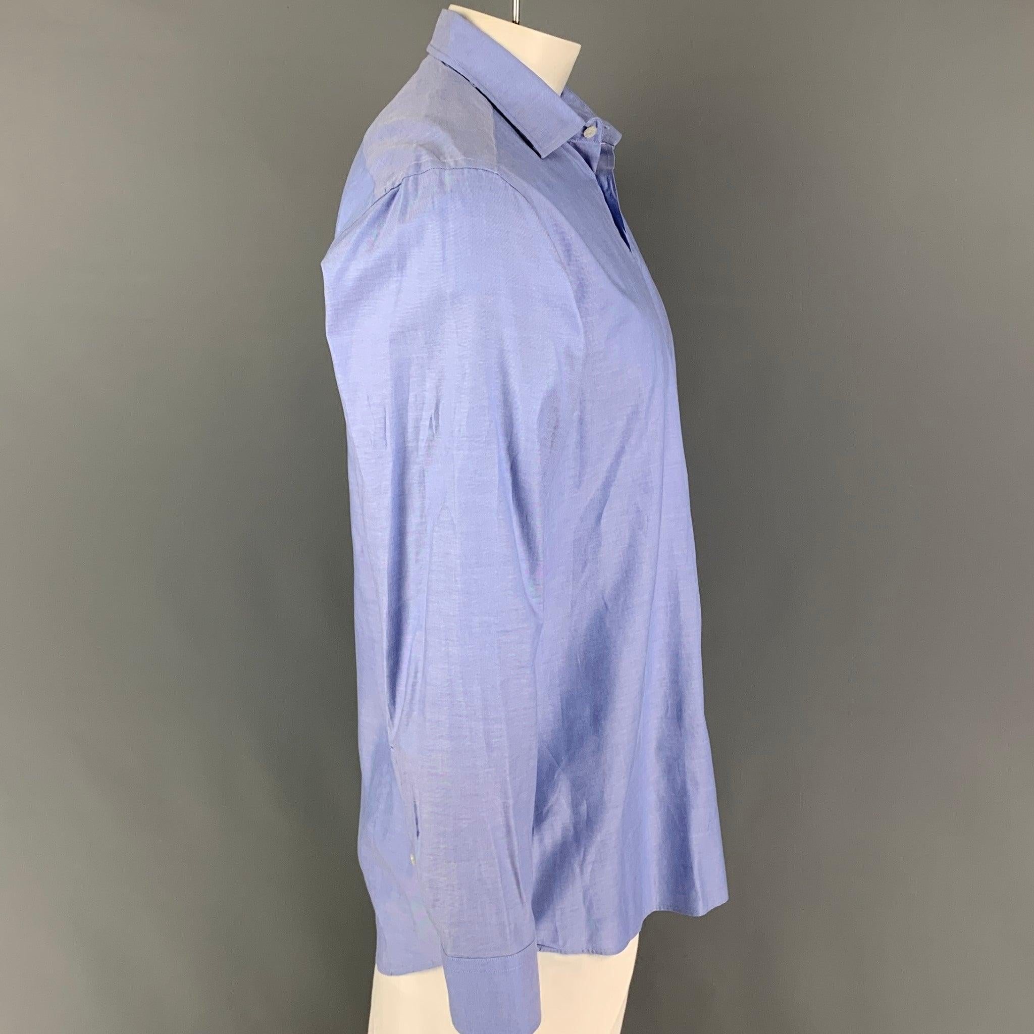 ETRO long sleeve shirt comes in a blue cotton featuring a spread collar and a button up closure. Made in Italy.
Very Good
Pre-Owned Condition. 

Marked:   42 

Measurements: 
 
Shoulder: 19 inches  Chest: 44 inches  Sleeve: 26 inches  Length: 32.5