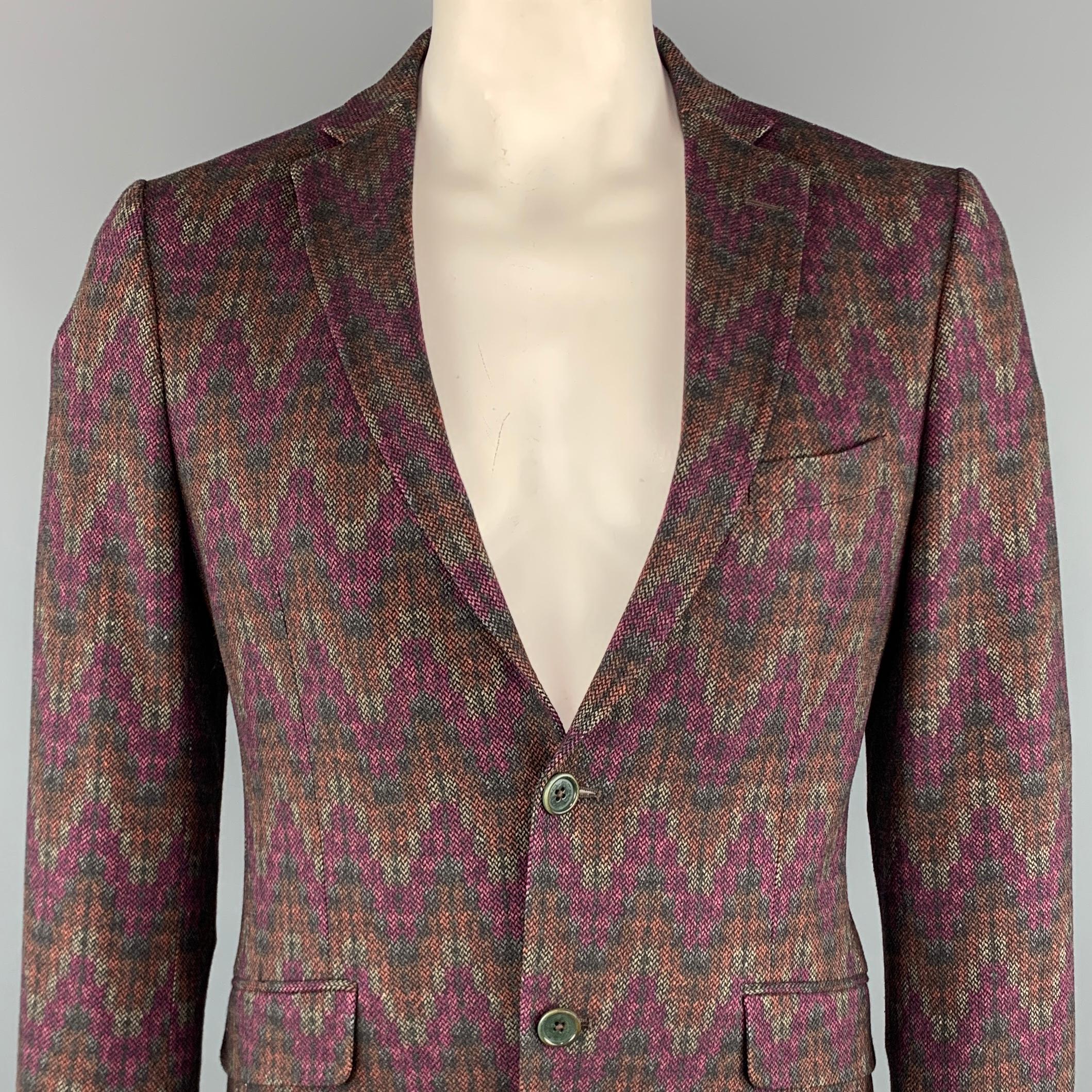 ETRO sport coat comes in a multi-color print wool blend with a notch lapel, silk lining, flap pockets, and a two button closure. Made in Italy.

 

Excellent Pre-Owned Condition. Made in Italy.
Marked: IT 52

Measurements:

Shoulder: 17.5 in. 