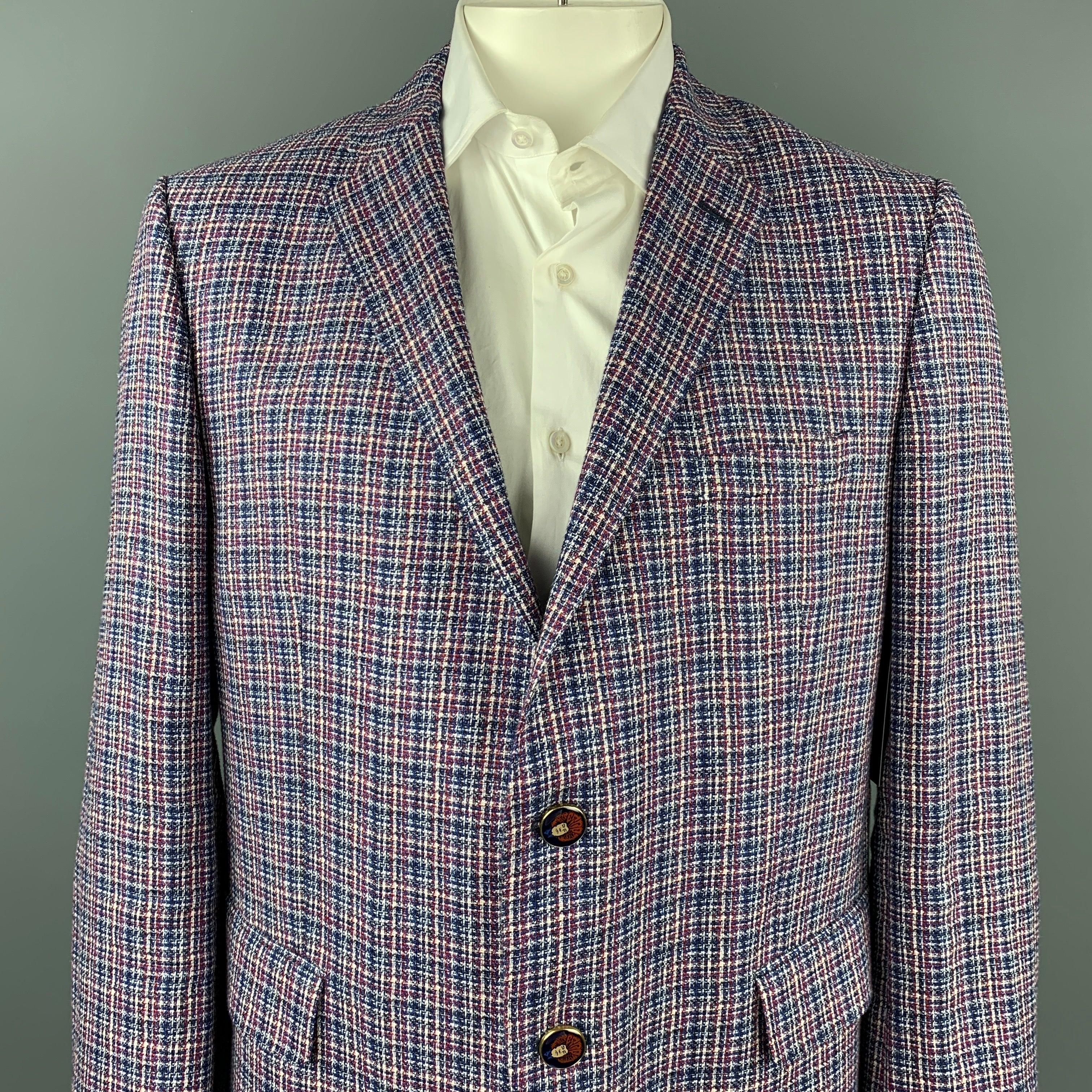 ETRO sport coat comes in a blue & red plaid hemp blend with a full abstract print liner featuring a notch lapel, flap pockets, and a two button closure. Made in Italy.Very Good
Pre-Owned Condition. 

Marked:   IT 58 

Measurements: 
 
Shoulder: 18.5