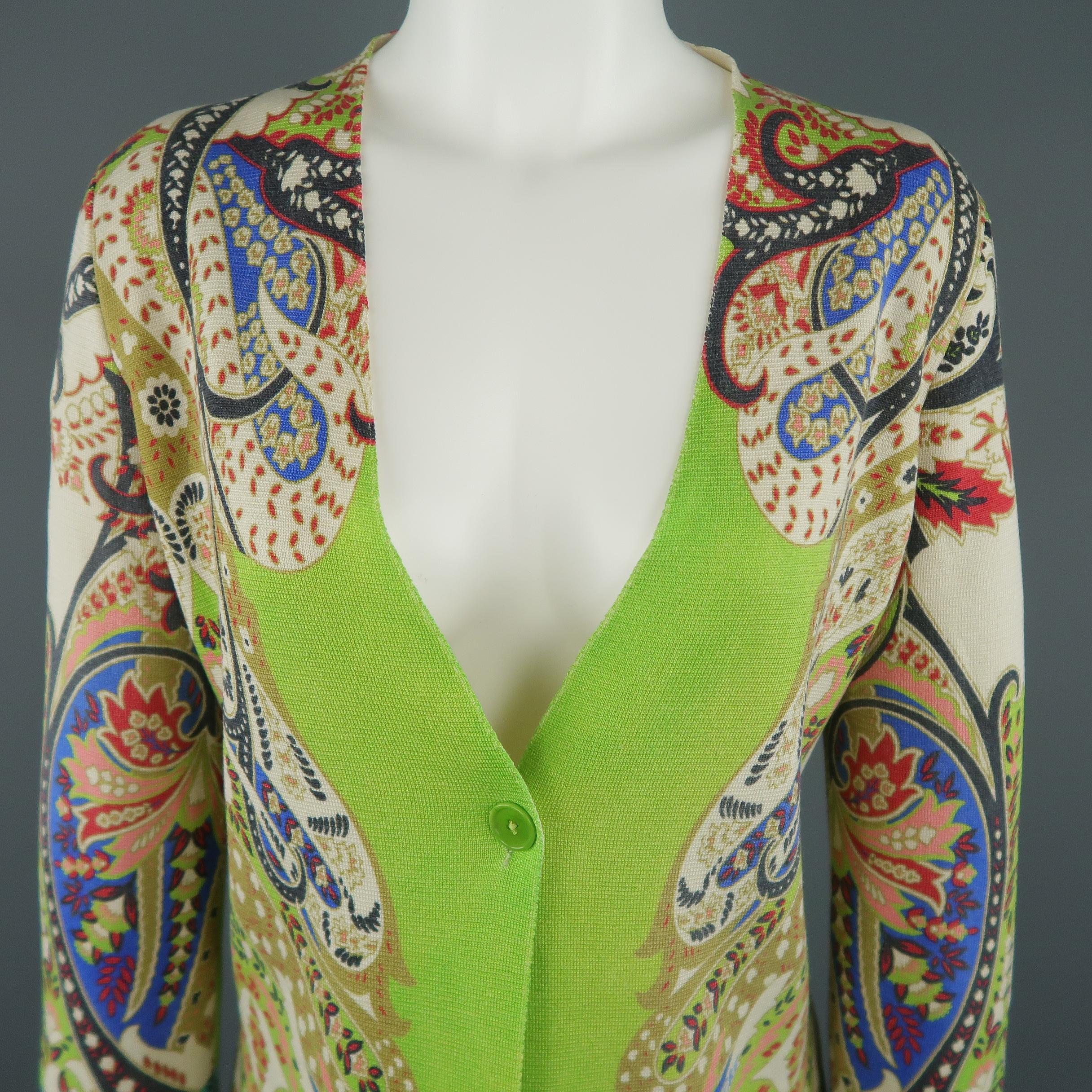 ETRO cardigan comes in a green silk knit with symmetrical abstract paisley print, v neck, and single button closure. Made in Italy.
 
Very Good Pre-Owned Condition.
Marked: IT 42
 
Measurements:
 
Shoulder: 16 in.
Chest: 40 in.
Sleeve: 22