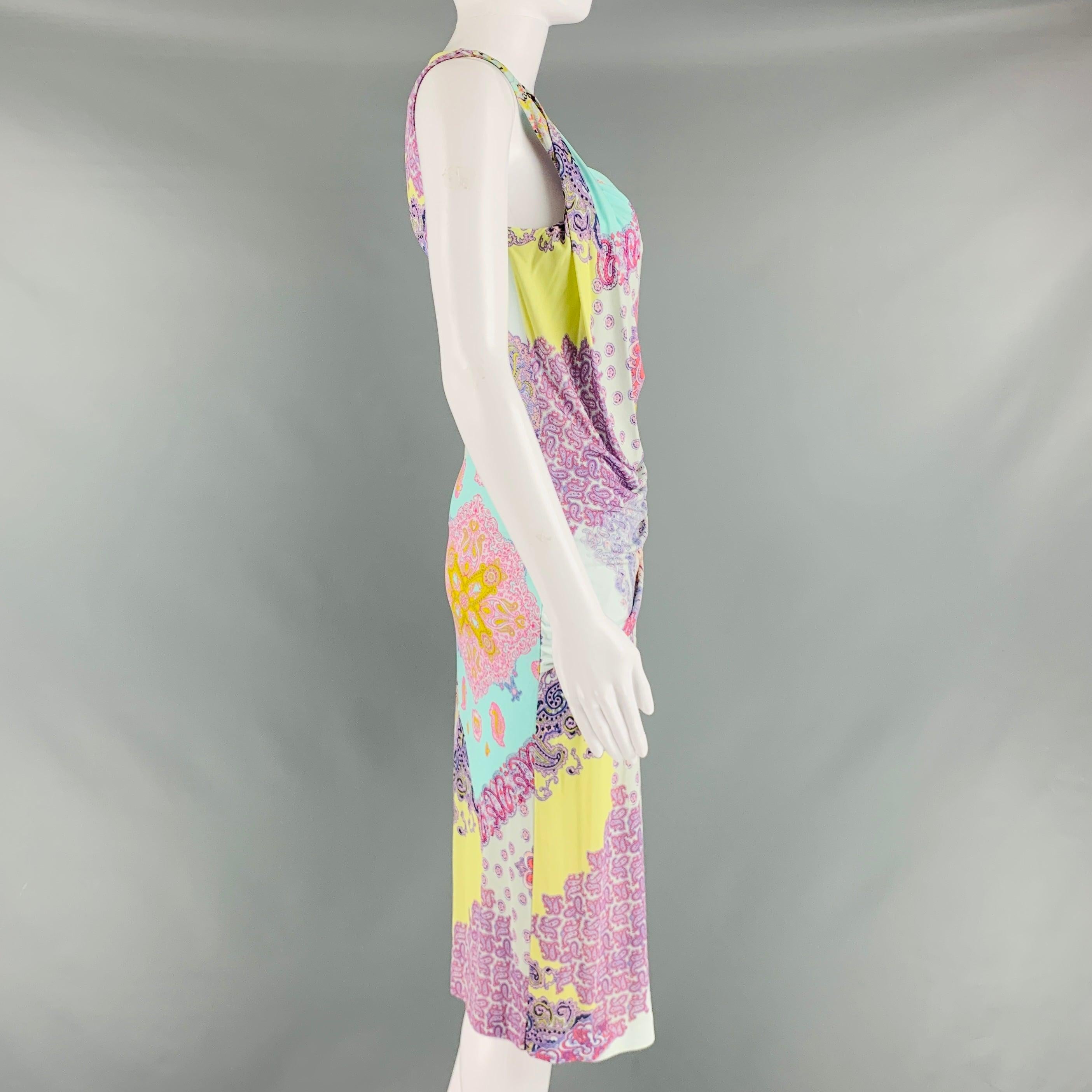 ETRO mid length dress comes in a multi-color and lilac viscose knit featuring a sleeveless style, and draped details. Made in Italy.Excellent Pre-Owned Condition. 

Marked:   42 

Measurements: 
 
Shoulder: 12 inches Bust: 32 inches Waist: 29 inches