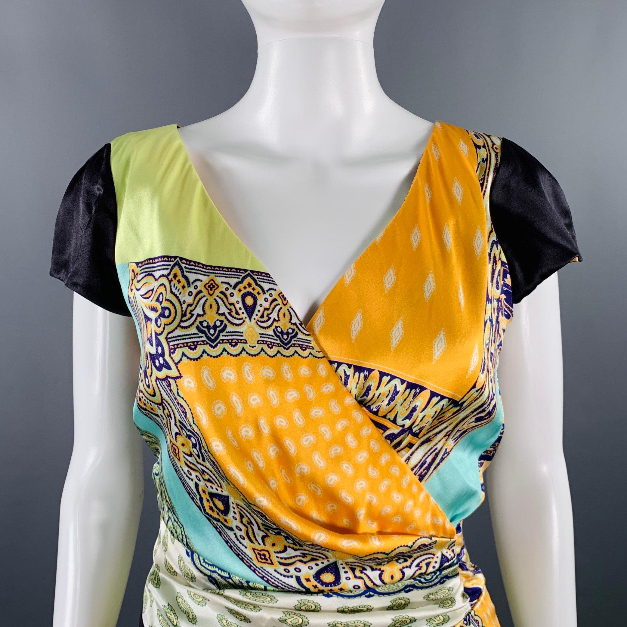 ETRO Kleid
aus einem mehrfarbigen Seiden-Stretch-Mischgewebe mit lebhaften gemischten Mustern, Cap-Ärmeln und seitlichem Reißverschluss. Made in Italy Ausgezeichneter Pre-Owned Zustand. 

Markiert:   IT 42 

Abmessungen: 
 
Schultern: 15 Zoll Ärmel: