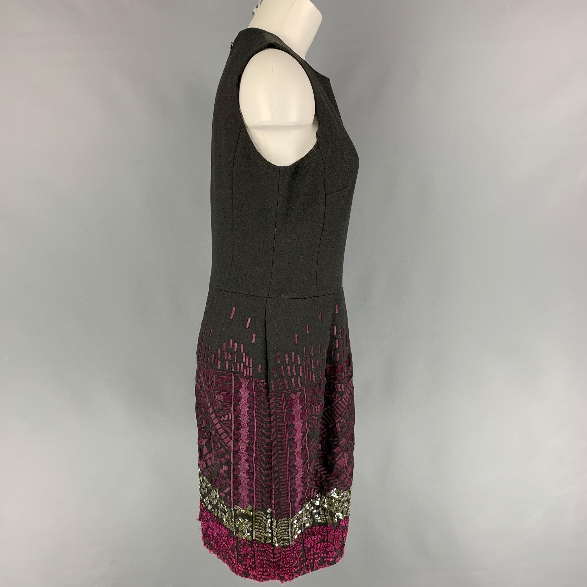 ETRO dress comes in a charcoal wool with embroidered designs featuring a pleated skirt, shift style, sleeveless, and a back zip up closure. Made in Italy.
Very Good
Pre-Owned Condition. 

Marked:   44 

Measurements: 
 
Shoulder: 13.5 inches  Bust: