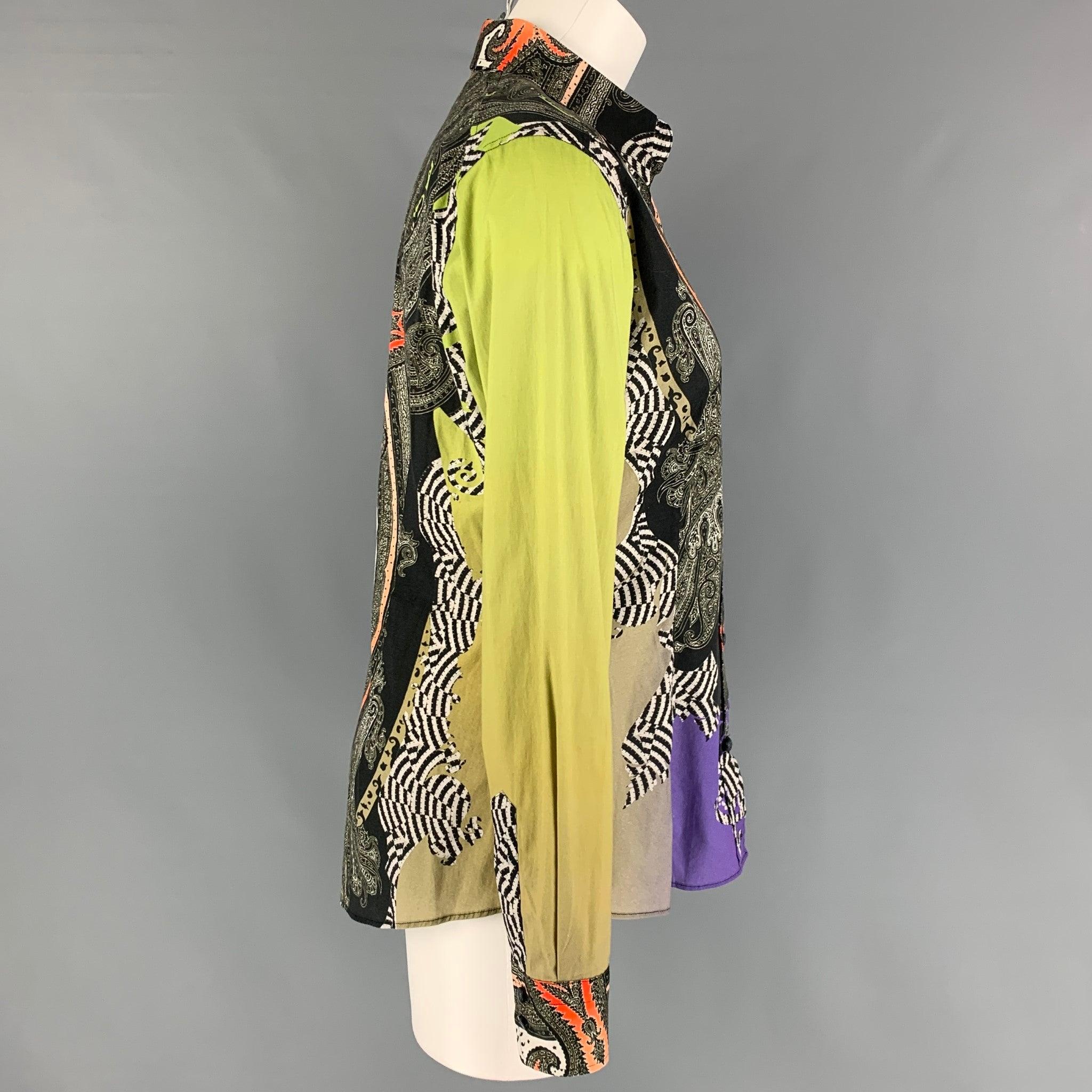 ETRO blouse comes in a multi-color paisley material featuring a spread collar and a button up closure. Made in Italy.
Very Good
Pre-Owned Condition. 

Marked:   44  

Measurements: 
 
Shoulder: 15.5 inches  Bust:
36 inches  Sleeve: 24.5 inches 