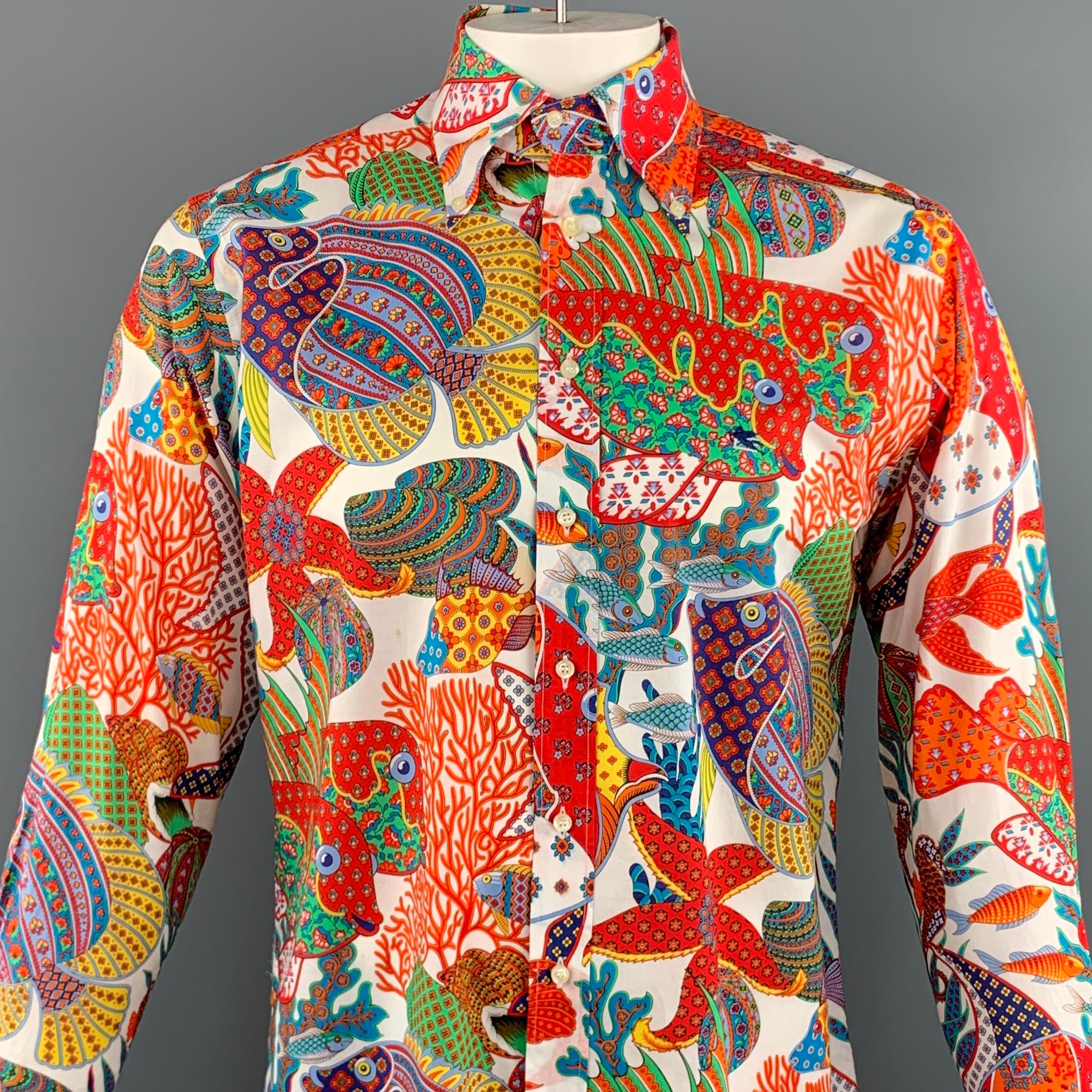 ETRO long sleeve shirt comes in a multi-color cotton featuring a abstract fish print throughout. button down style and a pointed collar. Made in Italy.
 
Excellent Pre-Owned Condition.
Marked: 41
 
Measurements:
 
Shoulder: 18 in.
Chest: 48