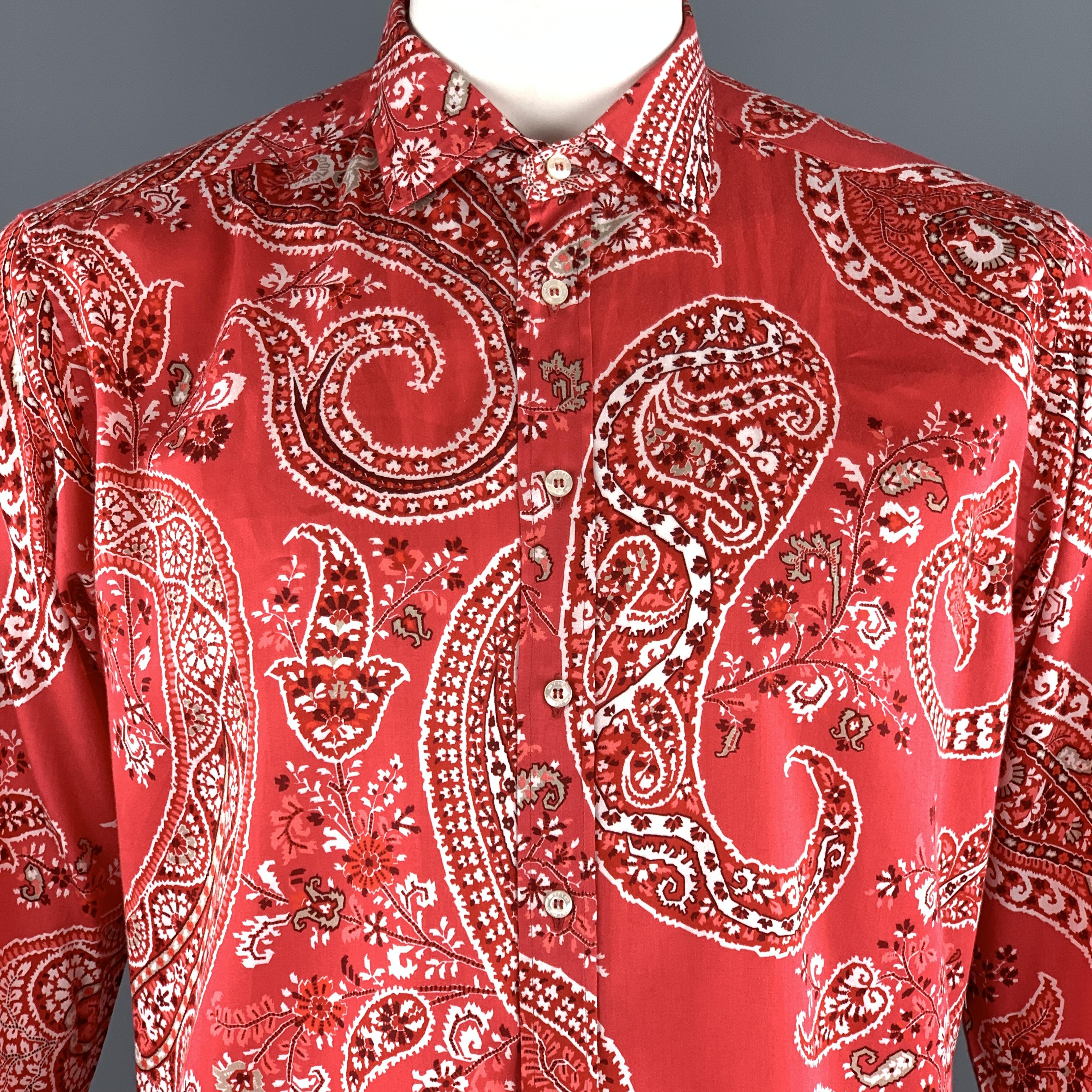 ETRO dress shirt comes in muted pink red paisley print cotton with a classic pointed collar. Made in Italy.

Excellent Pre-Owned Condition.
Marked: L

Measurements:

Shoulder: 18 in.
Chest: 46 in.
Sleeve: 25 in.
Length: 30 in.