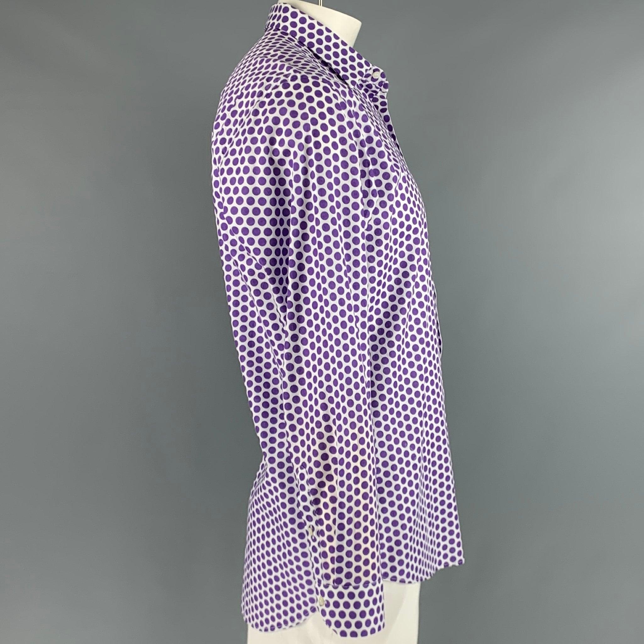 ETRO long sleeve shirt
in a
purple and white cotton weave featuring a polka dot pattern, spread collar, and button closure. Made in Italy.Very Good Pre-Owned Condition. Moderate signs of wear inside of collar. 

Marked:   43 

Measurements: 
