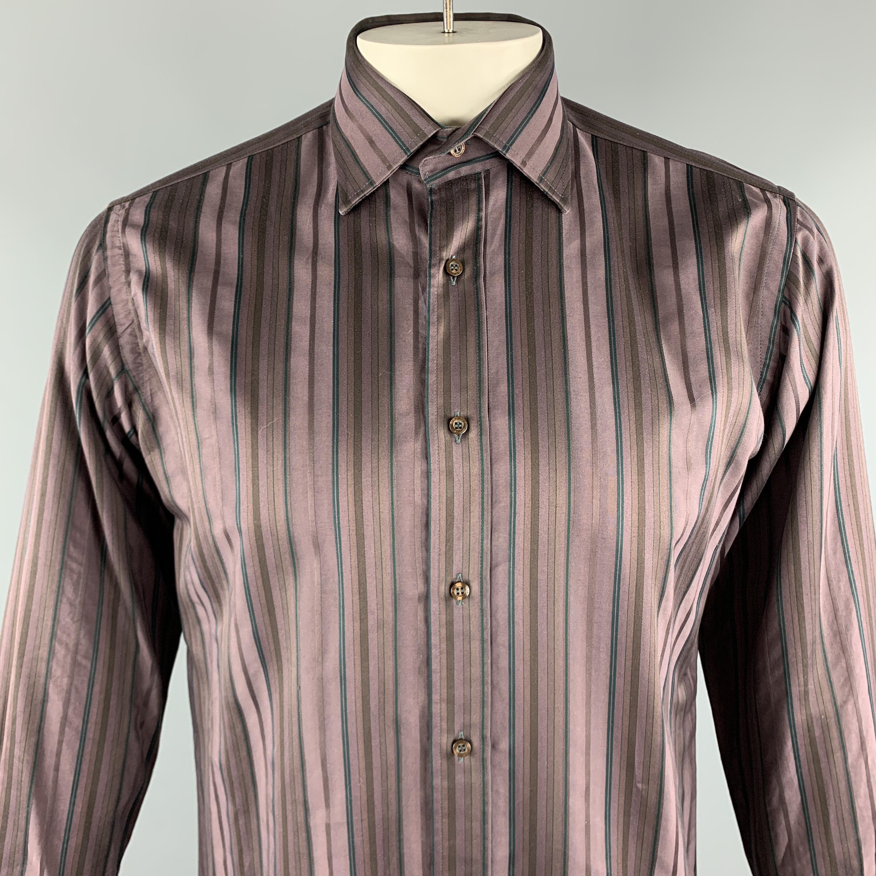 ETRO Long Sleeve Shirt comes in brown tones in a striped cotton material, with a spread collar and buttoned cuffs, button up. Made in Italy.

Very Good Pre-Owned Condition.
Marked: 40

Measurements:

Shoulder: 17.5 in. 
Chest: 46 in. 
Sleeve: 24.5