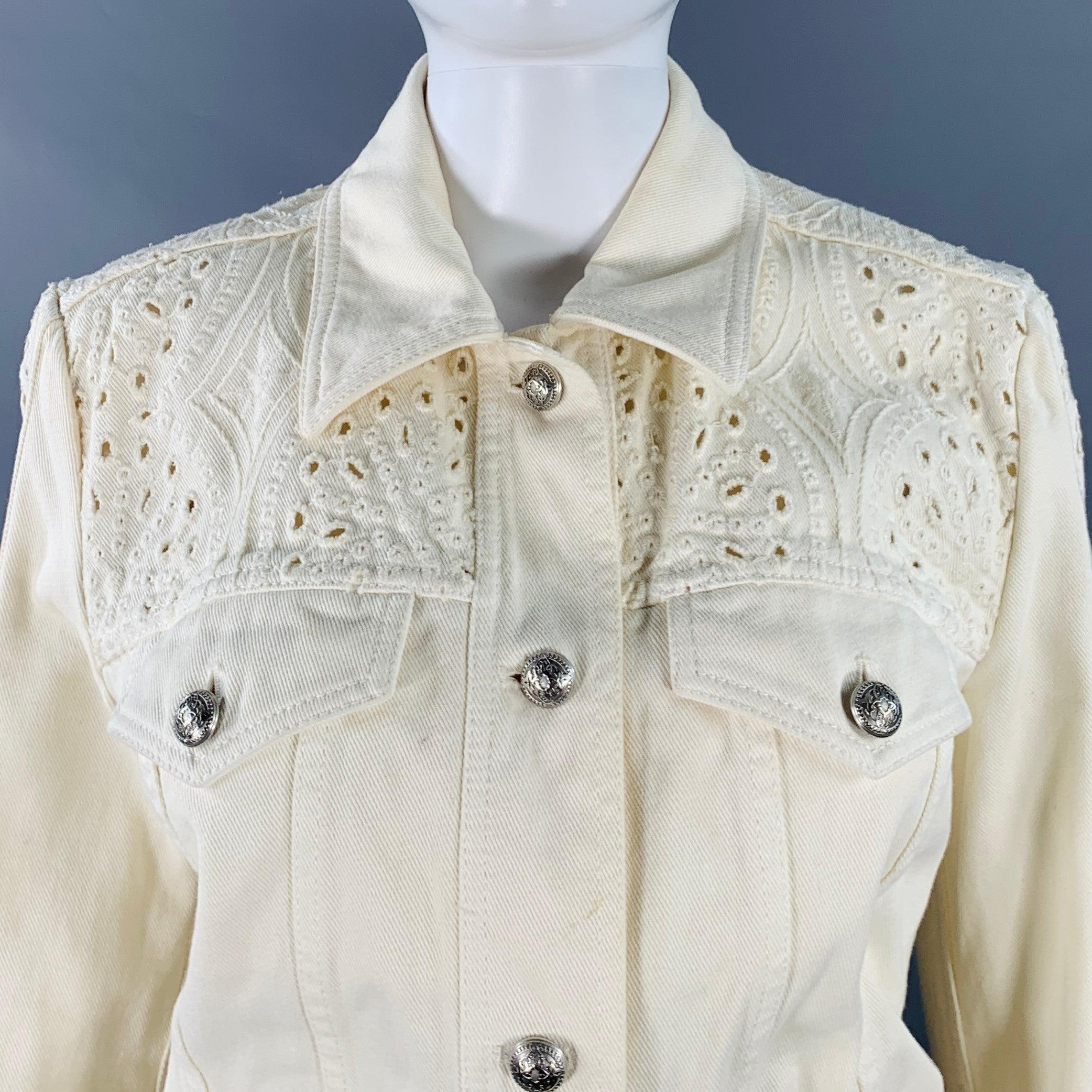 ETRO trucker jacket
in a cream denim featuring a eyelet design on back, sleeves, and shoulders; two pockets; and button closure. Good Pre-Owned Condition. Multiple marks, as is. Tags removed. 

Marked:   size not marked 

Measurements: 
 
Shoulder: