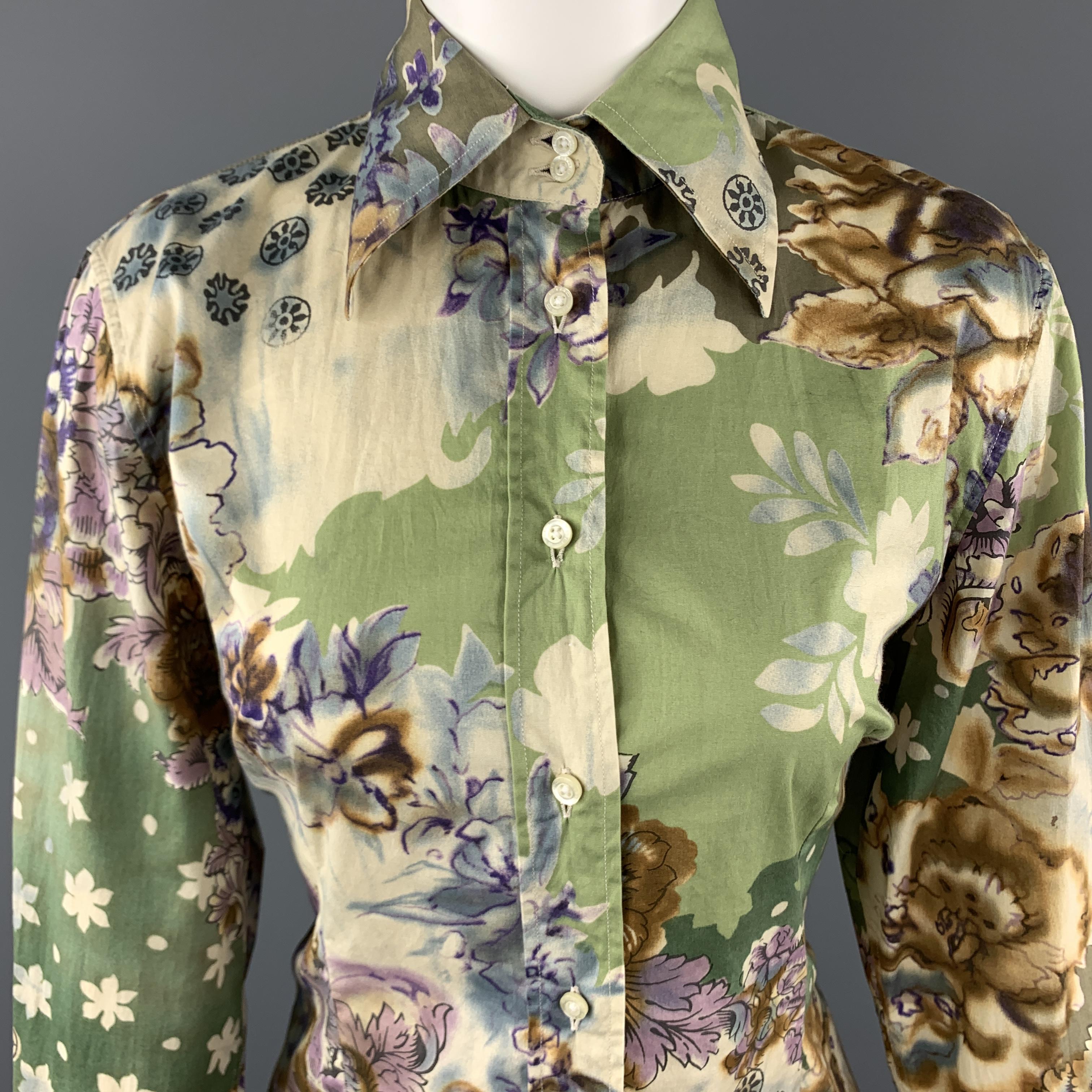 ETRO blouse comes in light abstract green floral print cotton with a pointed collar and button up front. Made in Italy.

Excellent Pre-Owned Condition.
Marked: IT 44

Measurements:

Shoulder: 16 in.
Bust: 40 in.
Sleeve: 24 in.
Length: 25 in.