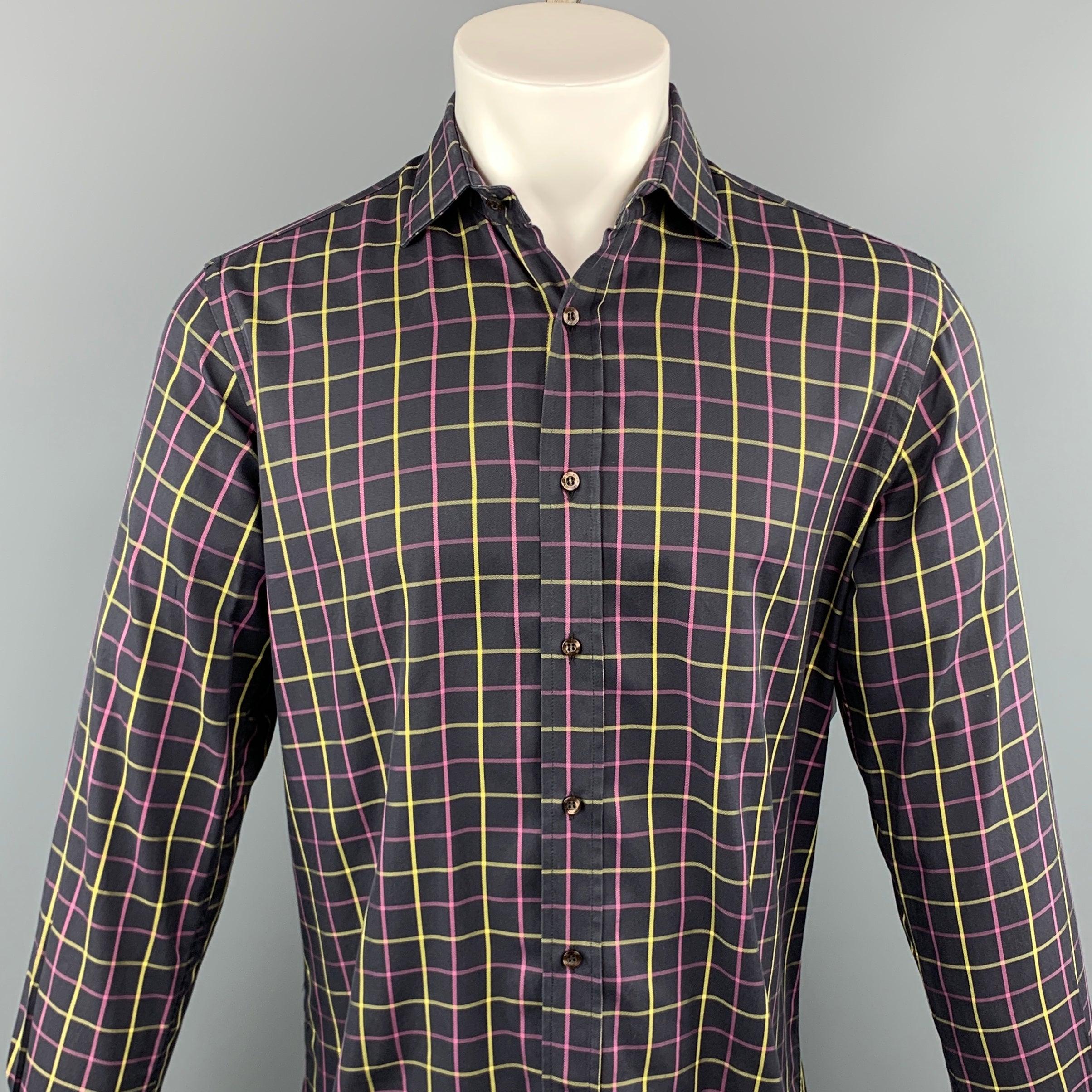 ETRO long sleeve shirt comes in a black and purple plaid cotton featuring a button up style and a spread collar. Made in Italy.Excellent Pre-Owned Condition. 

Marked:   40 

Measurements: 
 
Shoulder: 17 inches  Chest: 44 inches  Sleeve: 26.5