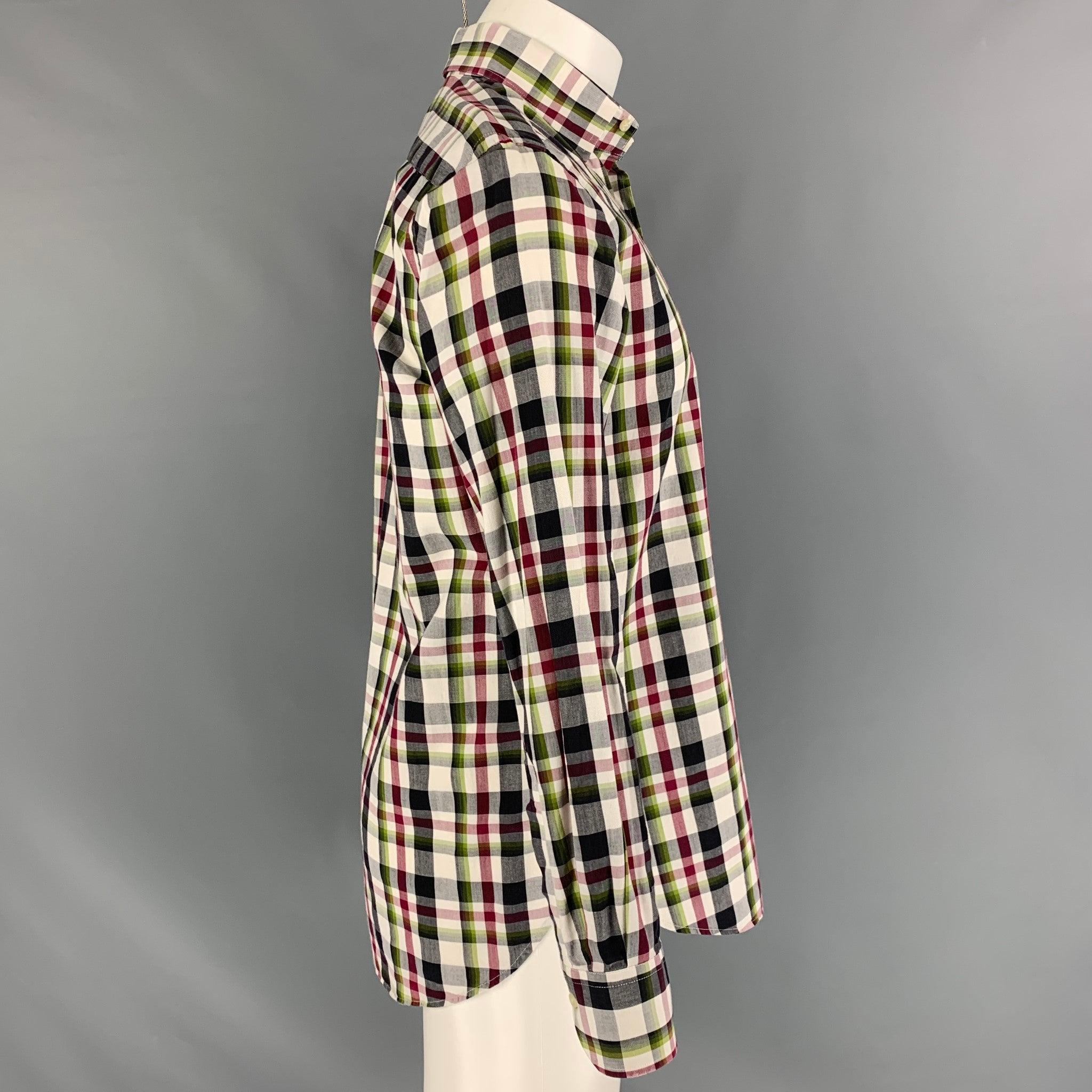 ETRO long sleeve shirt comes in a multi- colour plaid cotton featuring a button up style and a straight collar. Made in Italy.Excellent Pre-Owned Condition. 

Marked:   38 

Measurements: 
 
Shoulder: 17 inches Chest: 42 inches Sleeve: 25 inches