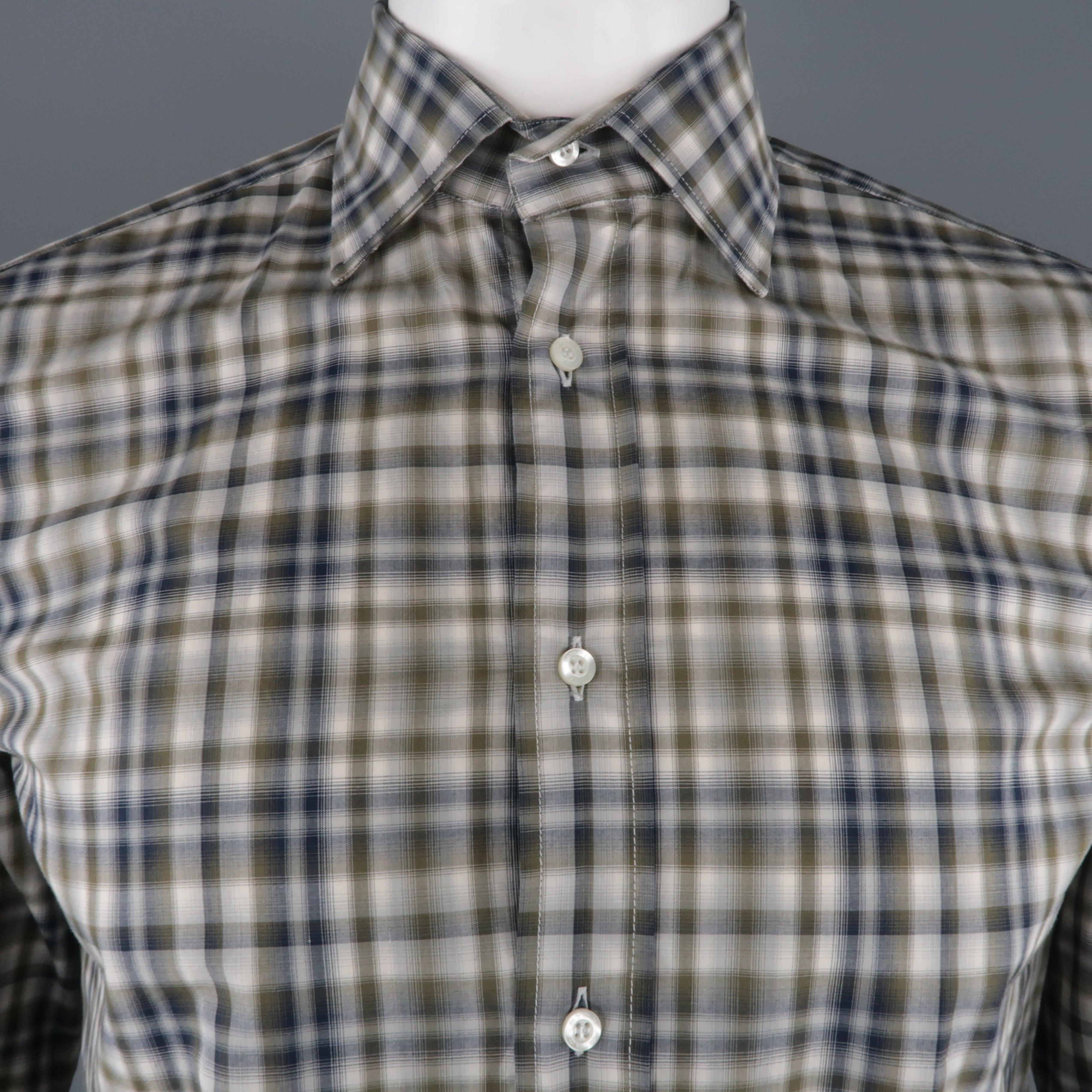 ETRO shirt comes in a olive and navy plaid cotton featuring a spread collar. Made in Italy.
Excellent Pre-Owned Condition.
 

Marked:   39
 

Measurements: 
  
l	Shoulder: 17 inches  
l	Chest: 45 inches  
l	Sleeve: 25.5 inches  
l	Length: 26.5
