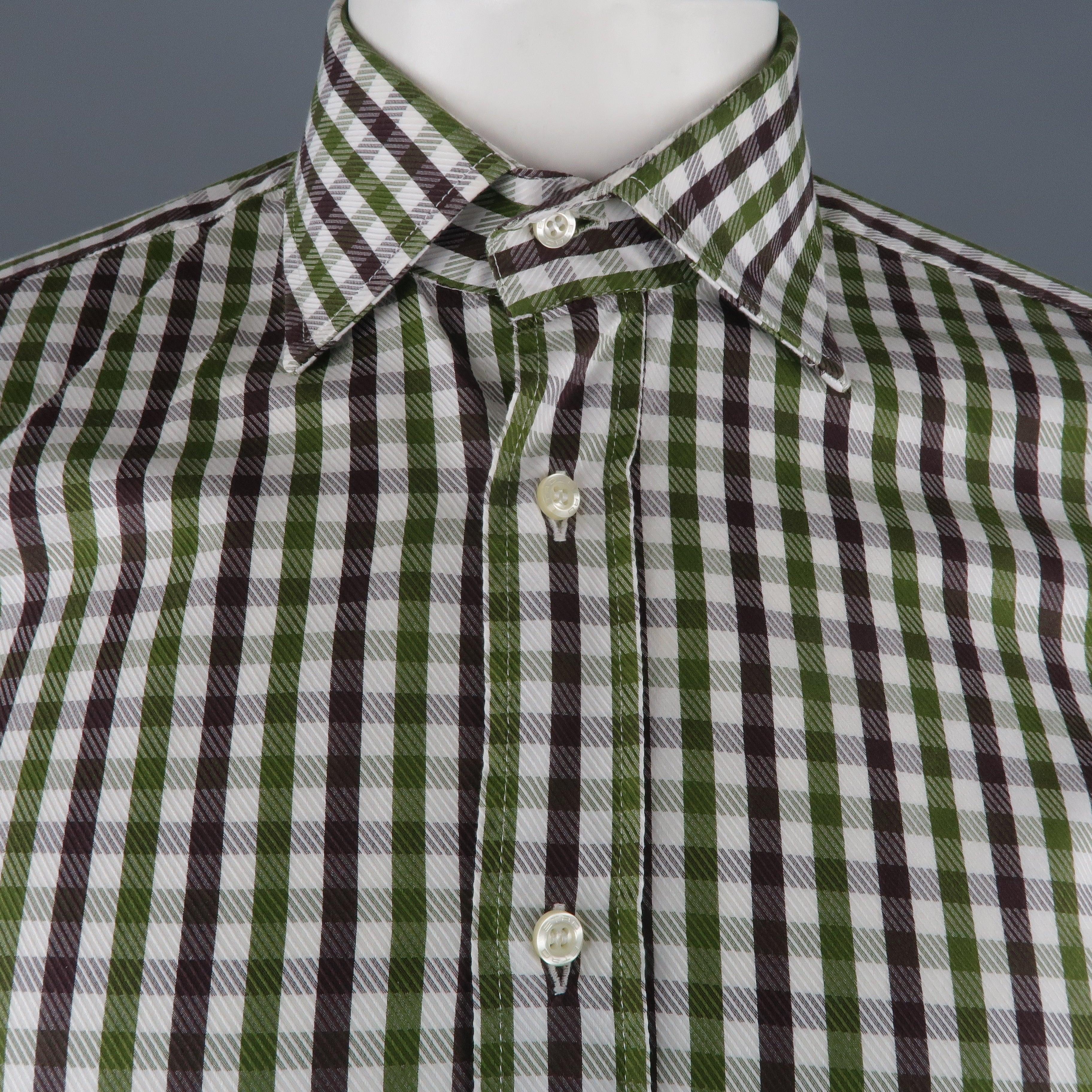 ETRO long sleeve shirt comes in a white and green checkered cotton featuring a spread collar. Made in Italy. 
Very Good Pre-Owned Condition.
 

Marked:   39
 

Measurements: 
  
l	Shoulder: 17.5 inches  
l	Chest: 45 inches  
l	Sleeve: 25.5 inches 