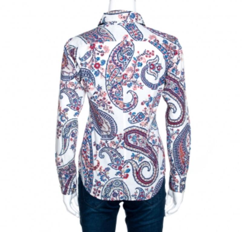 Confeccionada en algodón elástico, esta elegante camisa de Etro es ideal para los días informales. Luce un estampado paisley floral blanco. Tiene cuello sencillo, botones delanteros, mangas largas y está confeccionado para ofrecer un buen ajuste.