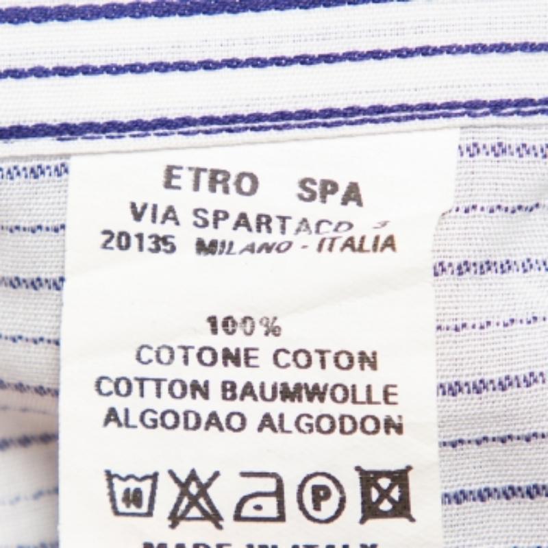 Lend a smart touch to formal looks with this cotton shirt from Etro. Designed with white and navy blue stripes, the shirt fashions a slim fit that, paired with plain tailored pants, will leave you looking and feeling like a well-dressed man, in the