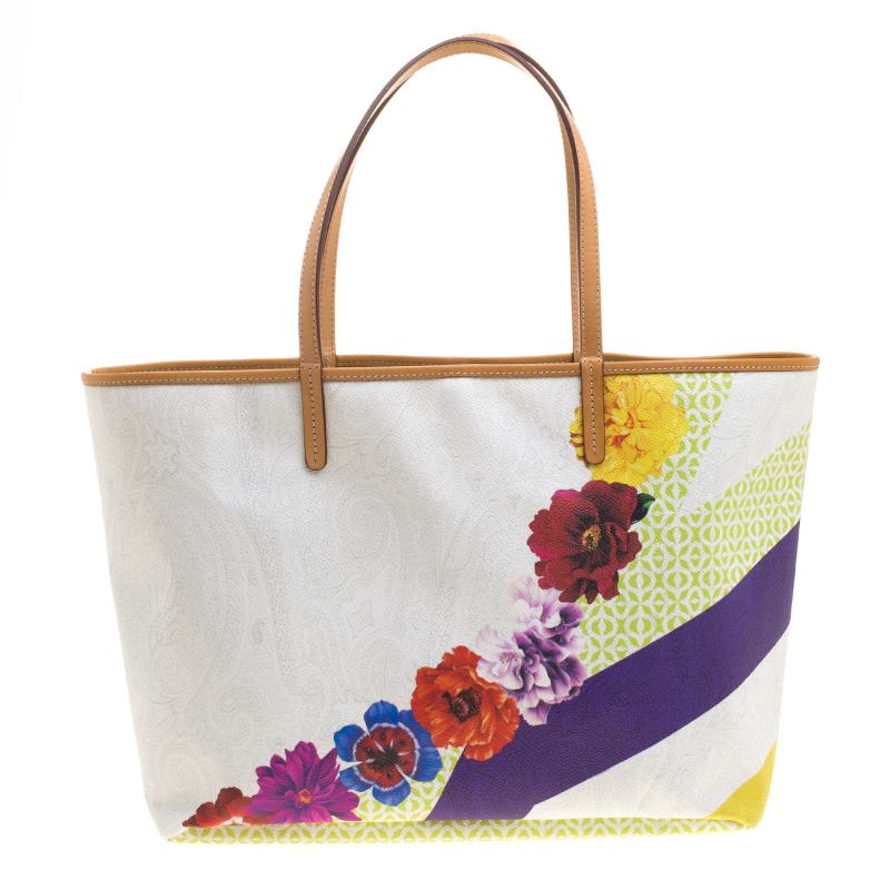 This shopper tote from the luxury fashion label, Etro, is handy and the structure of the creation gives it a stylish edge. It is made of paisley-printed canvas and designed with leather trims, flower prints, and an ideally spacious fabric interior.