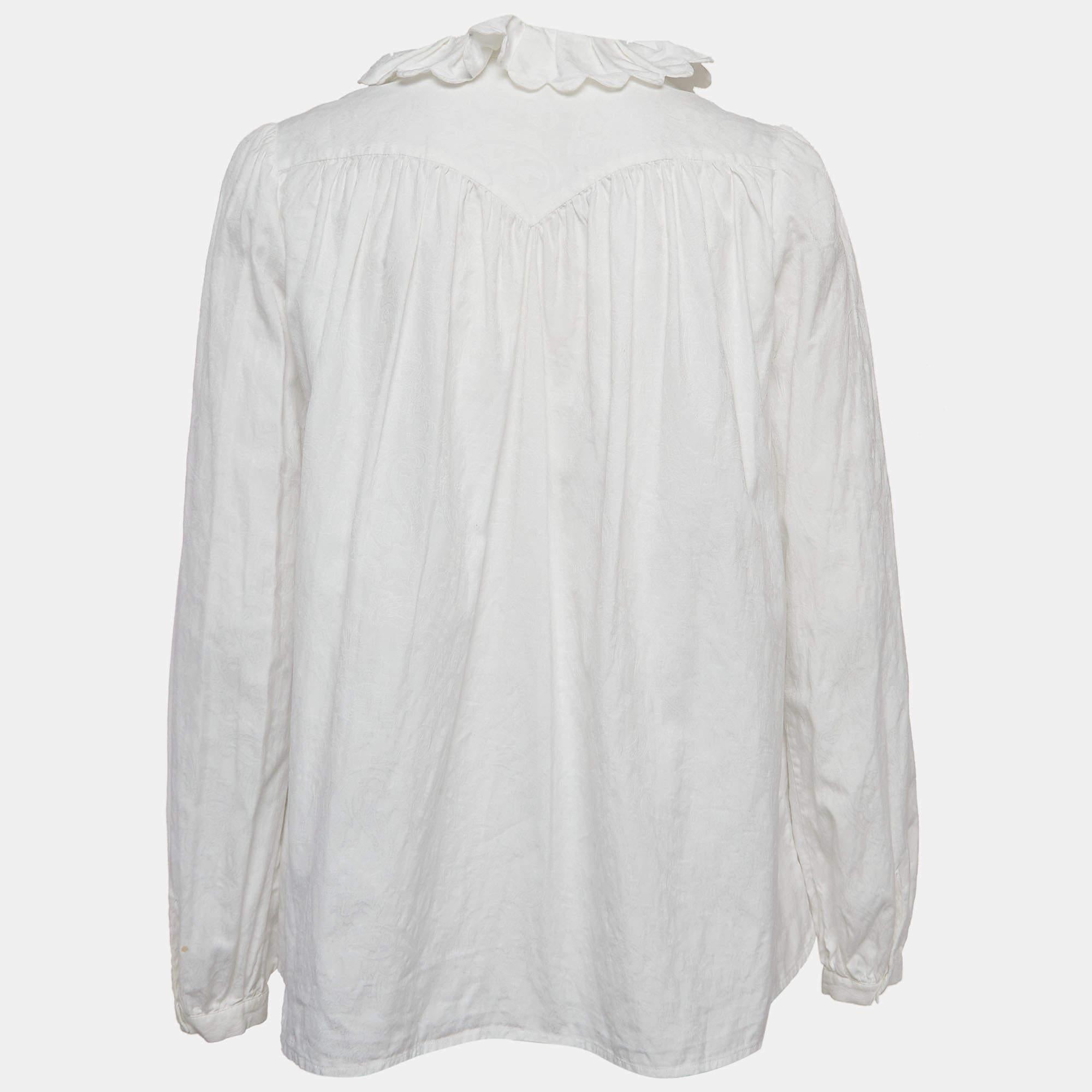 Mit dieser Designer-Bluse finden Sie Stil und Komfort. Die Kreation wurde aus den besten Stoffen geschneidert und mit vielen Details versehen. Kombinieren Sie es mit einer Hose und hohen Schuhen.
