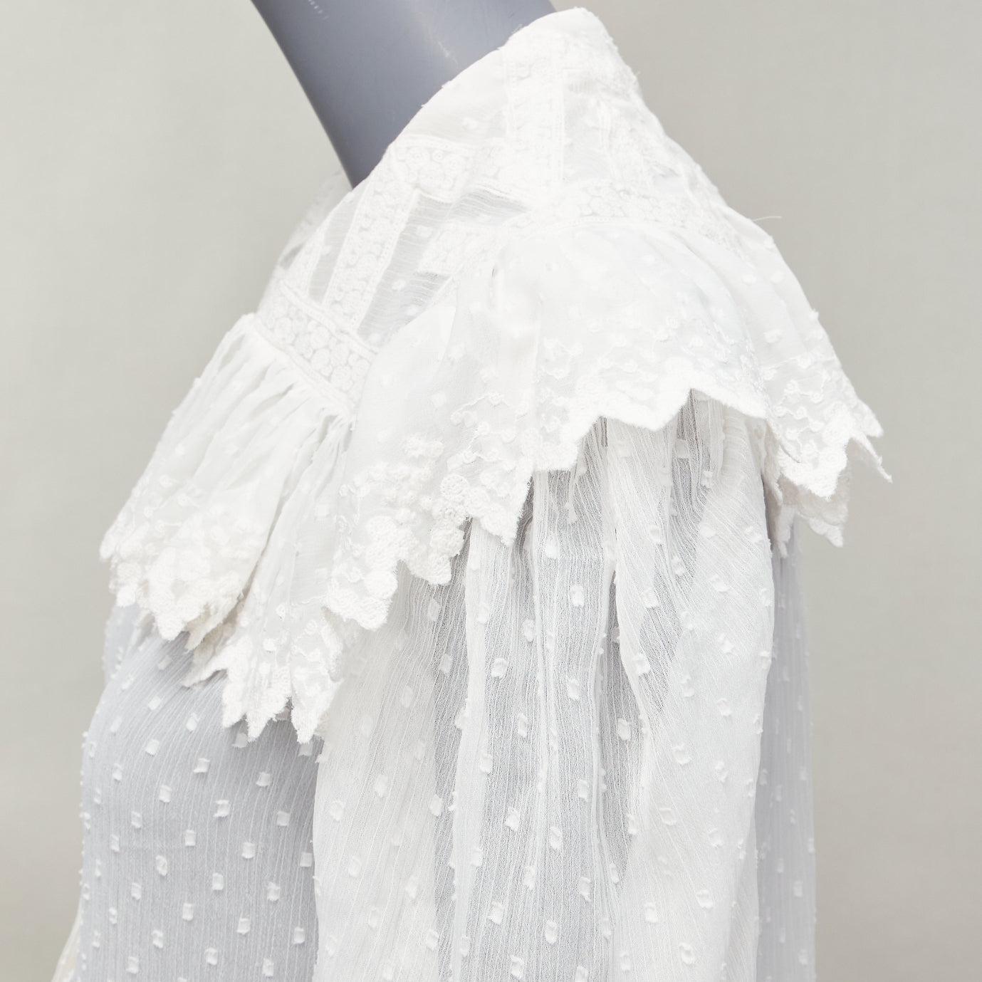 Etro, camicetta bianca in plissé con volant e colletto in stile boho peasant IT38 XS
Riferimento: AAWC/A00742
Marchio: Etro
Materiale: Poliestere
Colore: bianco
Modello: Tinta unita
Chiusura: bottone
Dettagli extra: Supporto con bottoni