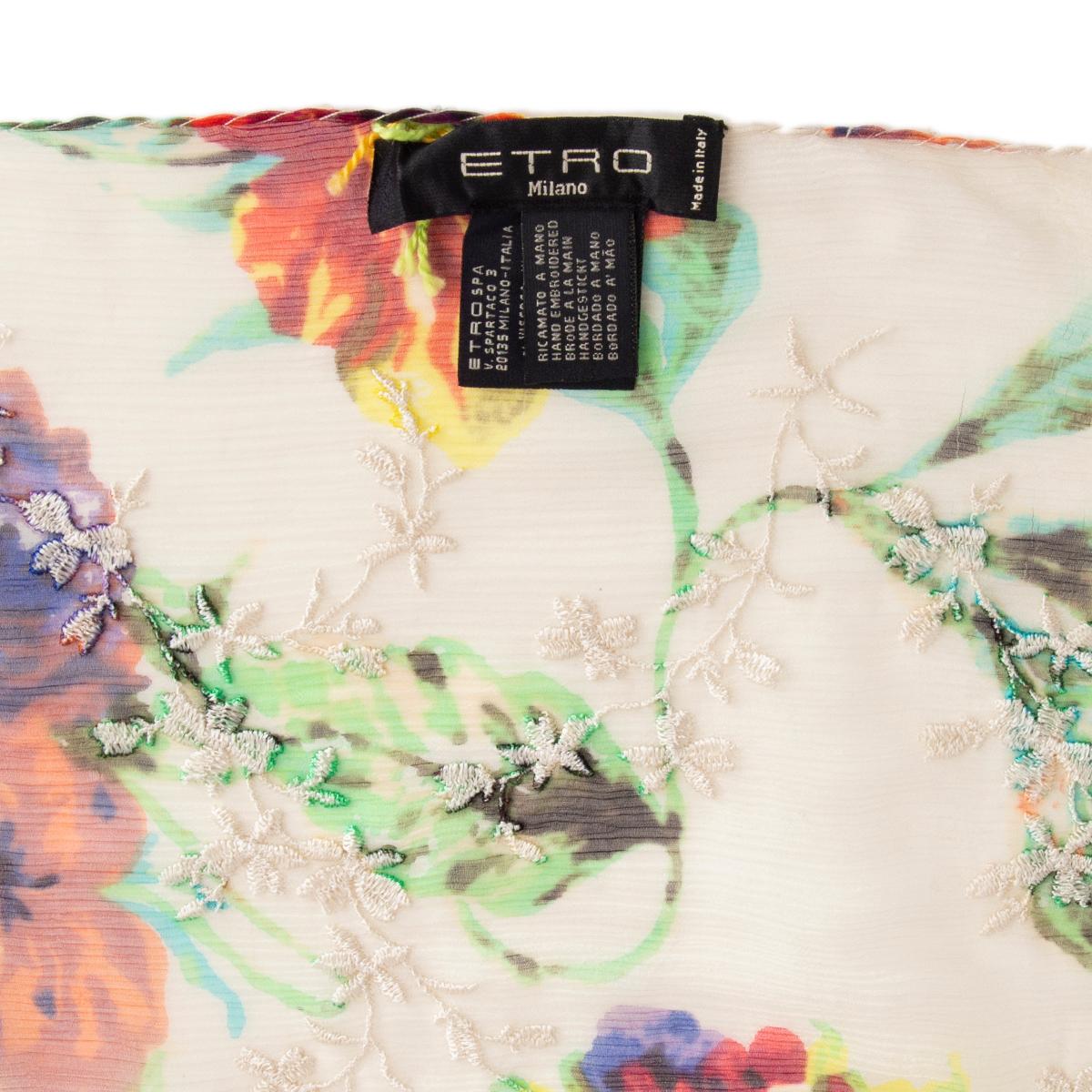 Etro off-white crepe scarf in viscose (54%), cotton (24%) and silk (22%) with multicolor floral-print, white floral embroidered and beaded tassel trim. Has been worn and is in excellent condition.

Width 65cm (25.4in)
Length 180cm (70.2in)
