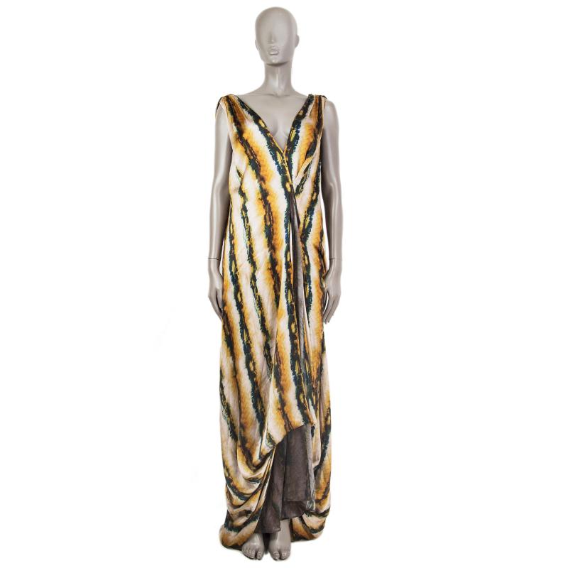 100% authentic Etro sleeveless maxi-dress in white, indigo, black, mustard, and green silk (100%). With v  neck, v back, and deep pleat on the front. Lined in semi-sheer military green and grey shadow-print isilk (100%). Has been worn and is in