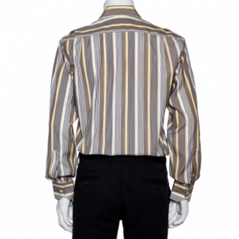 For days of style at work, Etro brings you this pretty creation. The shirt, styled with a striped pattern in yellow and navy blue hues, is both comfortable and stylish. It is designed with a collared neckline, cuffed sleeves, and lined with front
