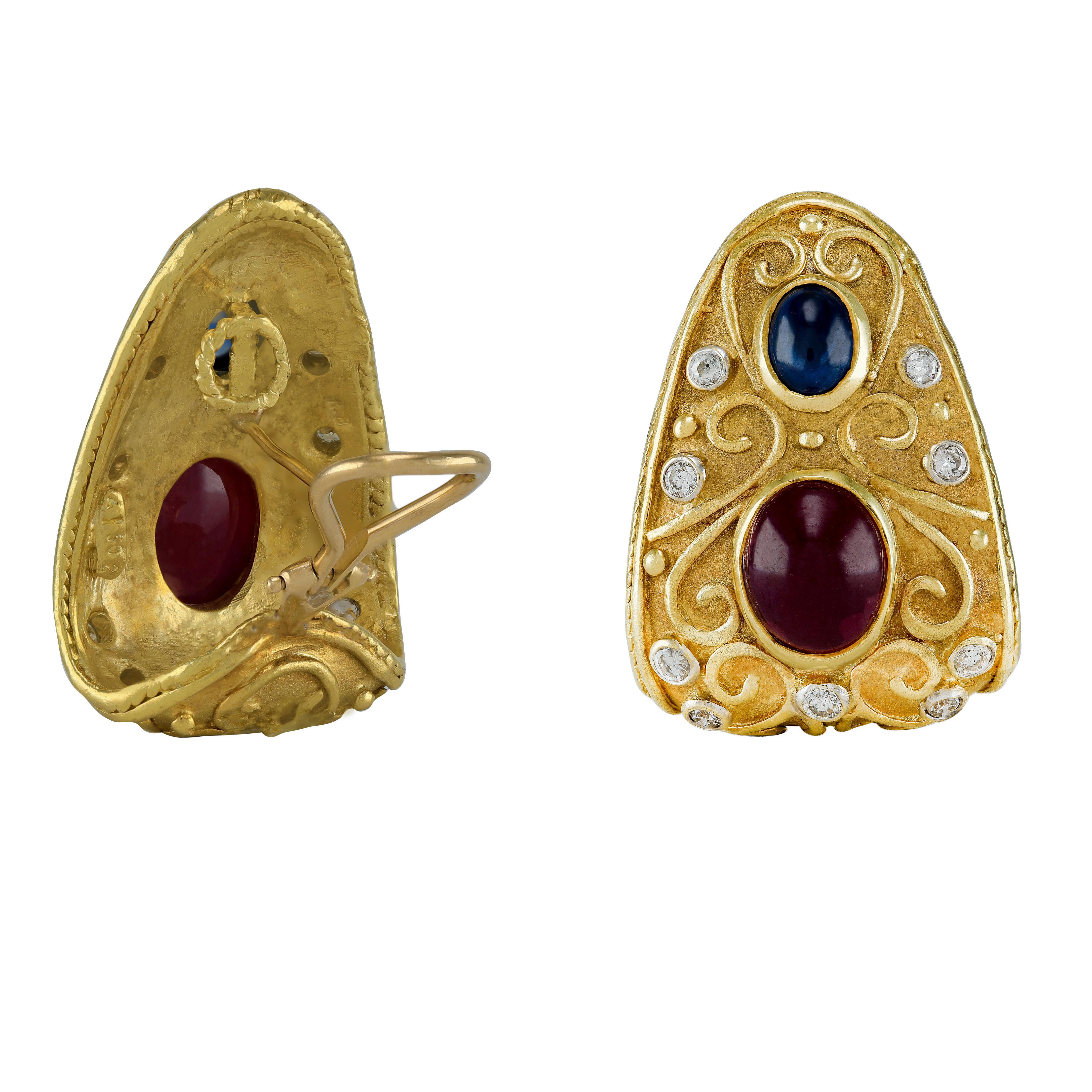 Etruscan 18k Cabochon Ruby and Sapphire Dimond Earring
Stunning bold earrings that will make a outstanding statement. A beautiful pair of well made handcrafted 18k solid gold earrings weighing a total of 31.1 grams. These beautiful Etruscan revival