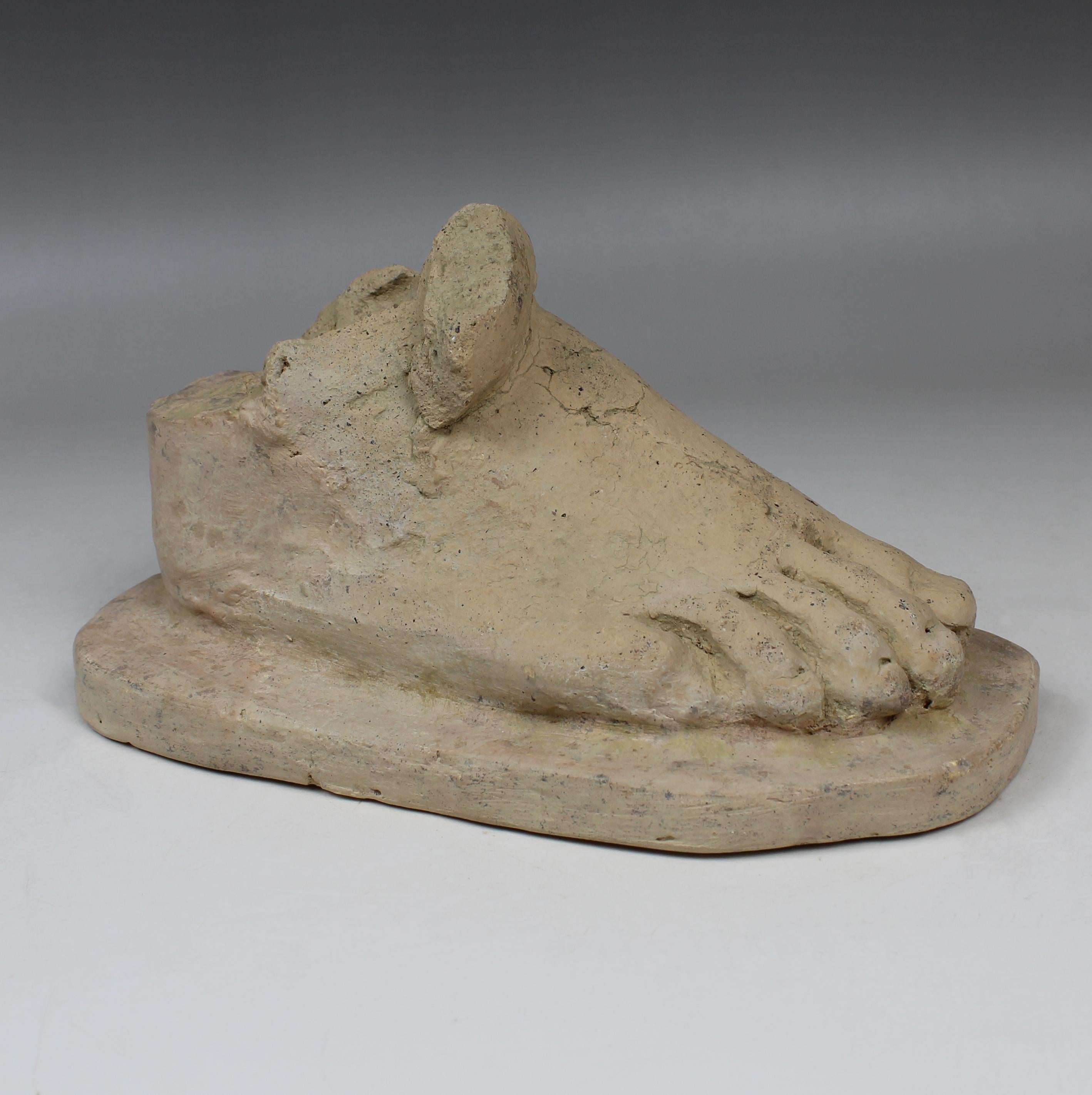 ITEM: Anatomical votive model of a foot
MATERIAL: Terracotta
CULTURE: Etruscan
PERIOD: 5th – 4th Century B.C
DIMENSIONS: 105 mm x 85 mm x 205 mm
CONDITION: Good condition
PROVENANCE: Ex Paul Suttman collection. Acquired by Suttman in the 1960’s when