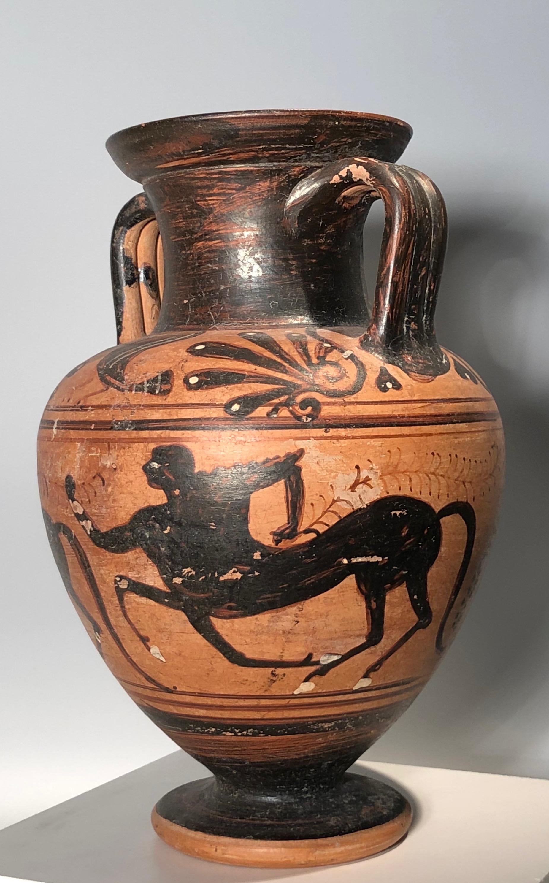 Etruscan black figure amphora depicting three galloping centauri, 
circa 500 – 470 BC. 
Attributed to the circle of the Micali Painter. 
The vase is in an intact condition. No restoration and no paint retouching. 
Centauri are in Greek mythology