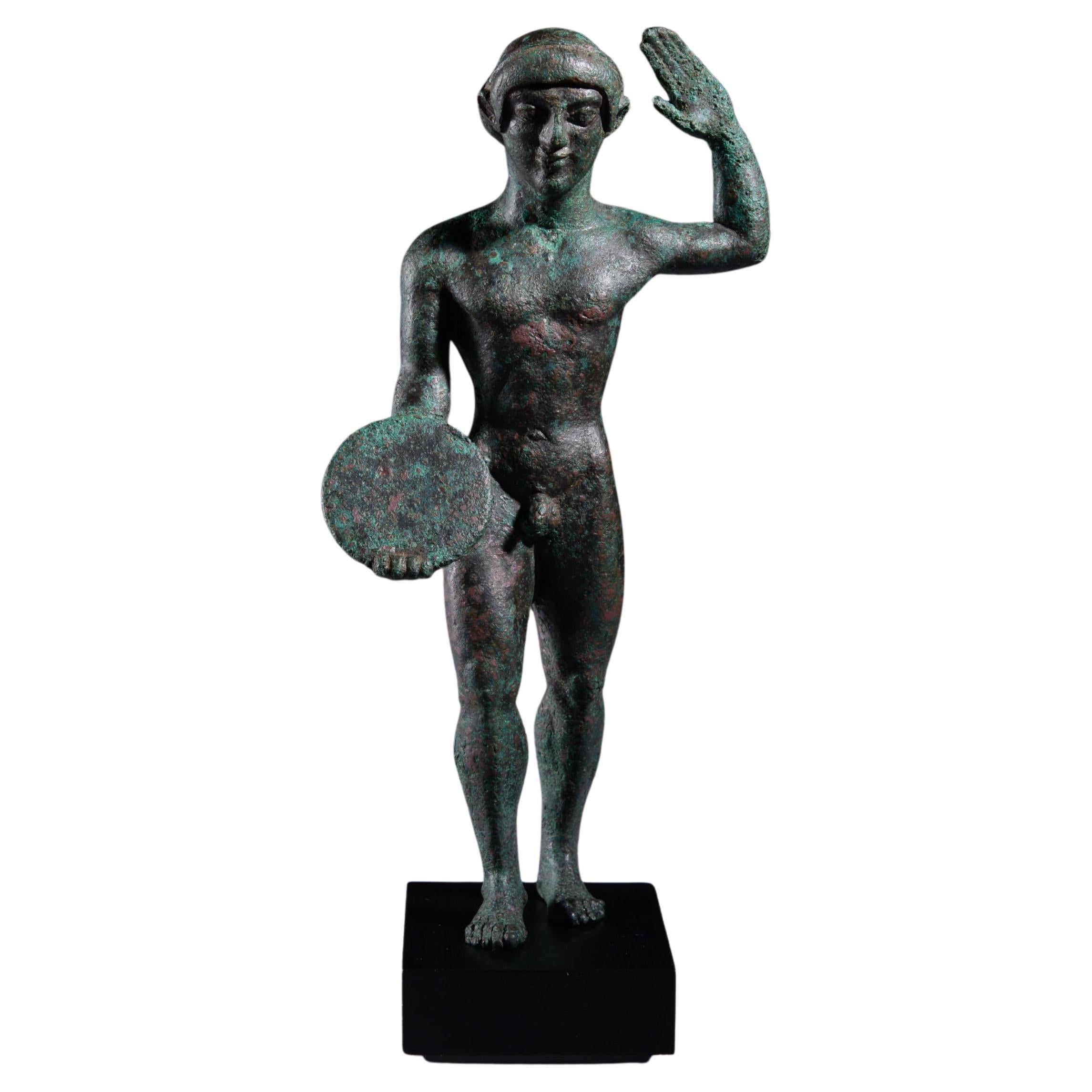 Lanciatore di disco etrusco in bronzo