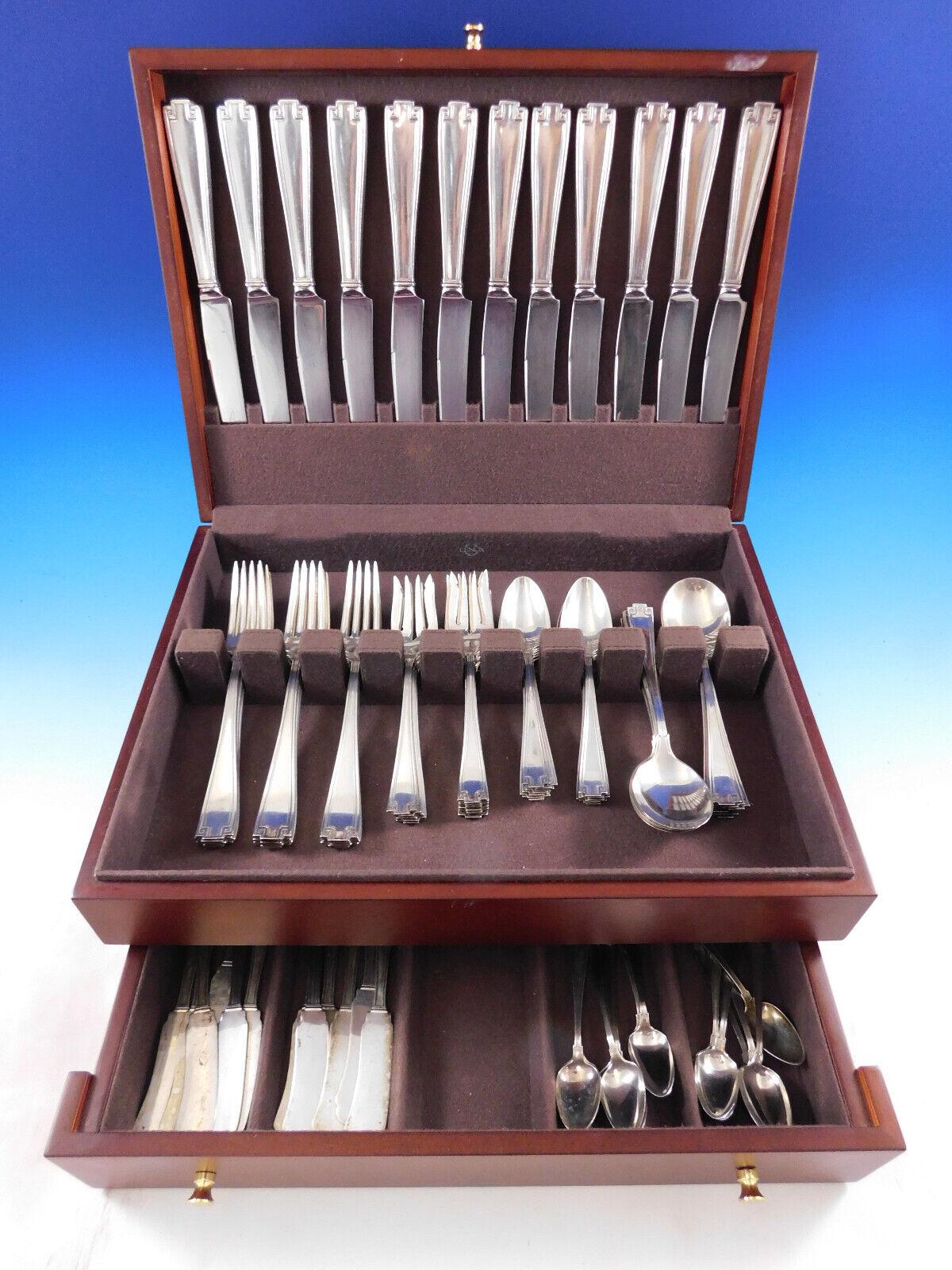 Vintage Gorham sterling silver flatware set in the Etruscan pattern featuring an Art Deco style Greek Key design. Although this pattern was released in the year 1913, one can see that it was a forerunner for the Art Deco designs that would follow