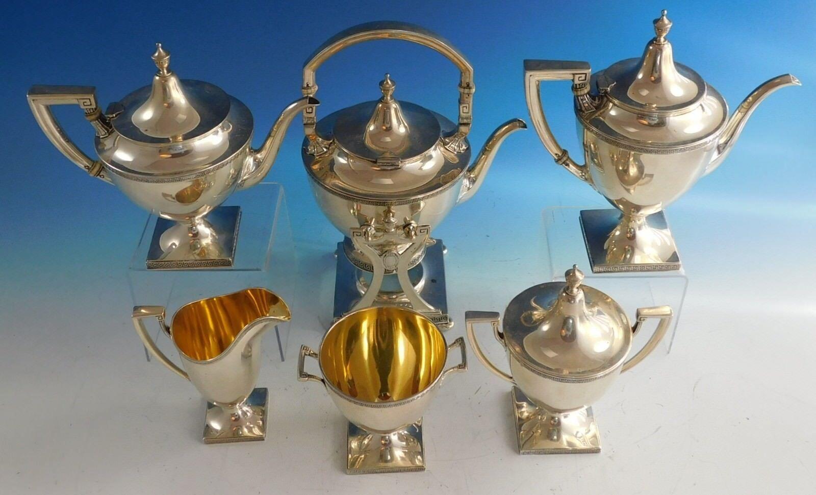 Etruscan by Gorham

Etruscan by Gorham sterling silver 6-piece tea set with date marks for 1923. The set includes: 

1 - Kettle on Stand: Marked with #A9806, it weighs 42.11 ozt., and measures 12