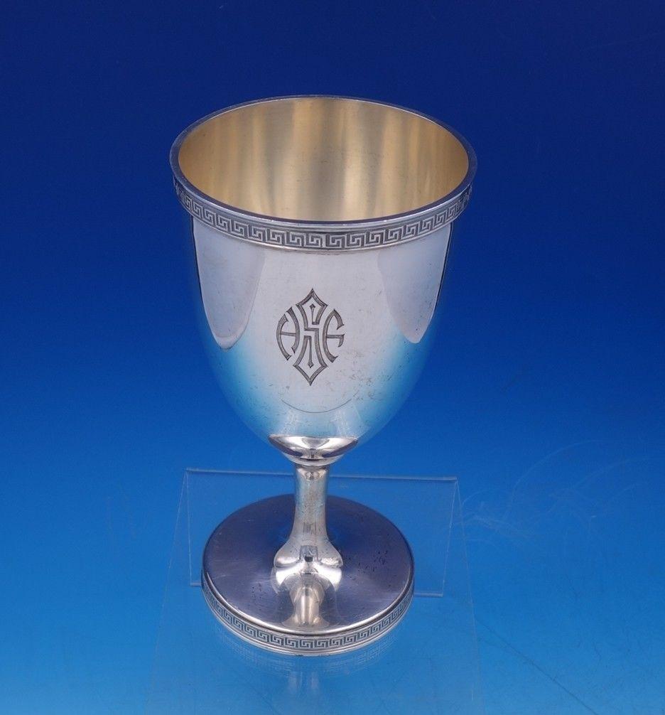 Etruscan by Gorham sterling silver water goblet marked #9838. This goblet measures 6 tall x 3 in diameter and weighs 6.6 troy ounces. It is monogrammed (see photos), and is in excellent condition. Fabulous.

Multiple quantities (of many items) are