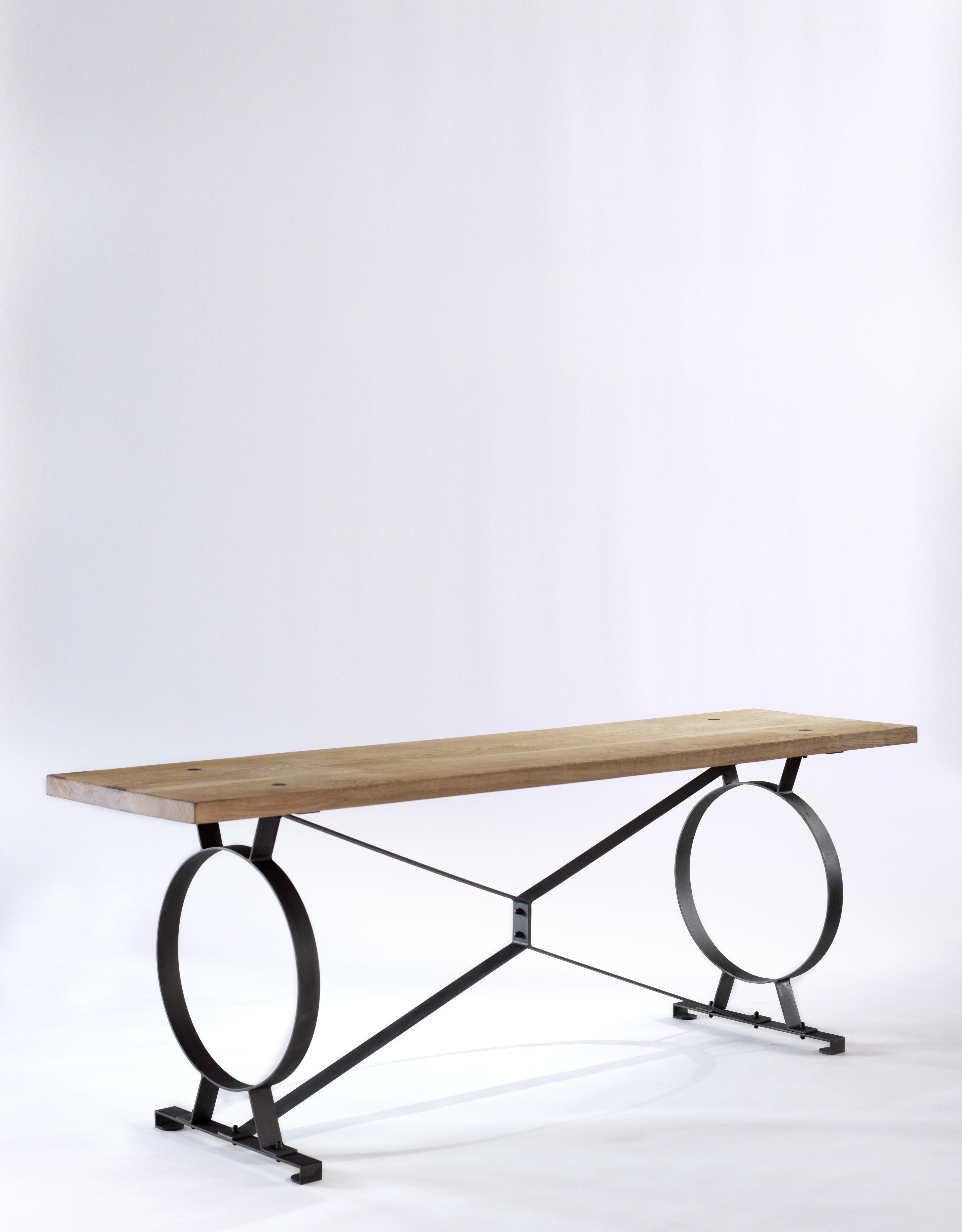 A raw oak and ebonized steel sofa table
B.B. - Inspired by Etruscan designs, it can be used either behind a sofa or as a great object table against the wall. Its construction allows for a rather satisfying springiness. I love the rebated steel