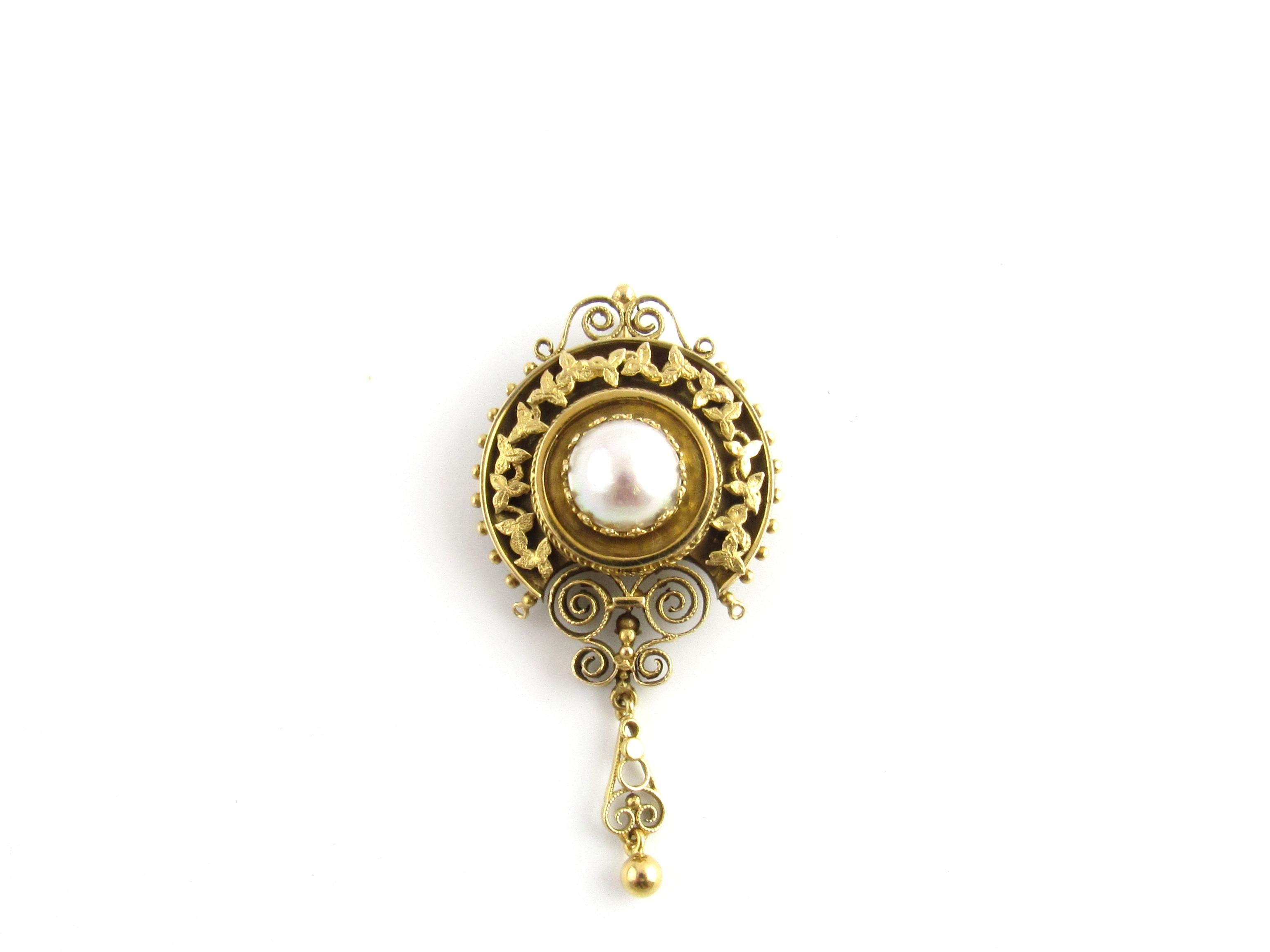 Etruscan Revival 14K Yellow Gold and Mabe Pearl Pin Pendant

Professionally polished / Tested and Stamped 14K

Mabe Pearl is 11mm
piece weights 8.3 dwt / 13 g
2 5/16 x 1 3/16
