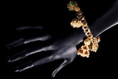 Etruscan Revival 18 Karat and 14 Karat Yellow Gold Charm Bracelet