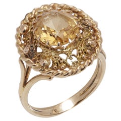 Antique Etruscan revival 18kt. yellow gold ring with 2.35 cts. of Yellow Sapphire