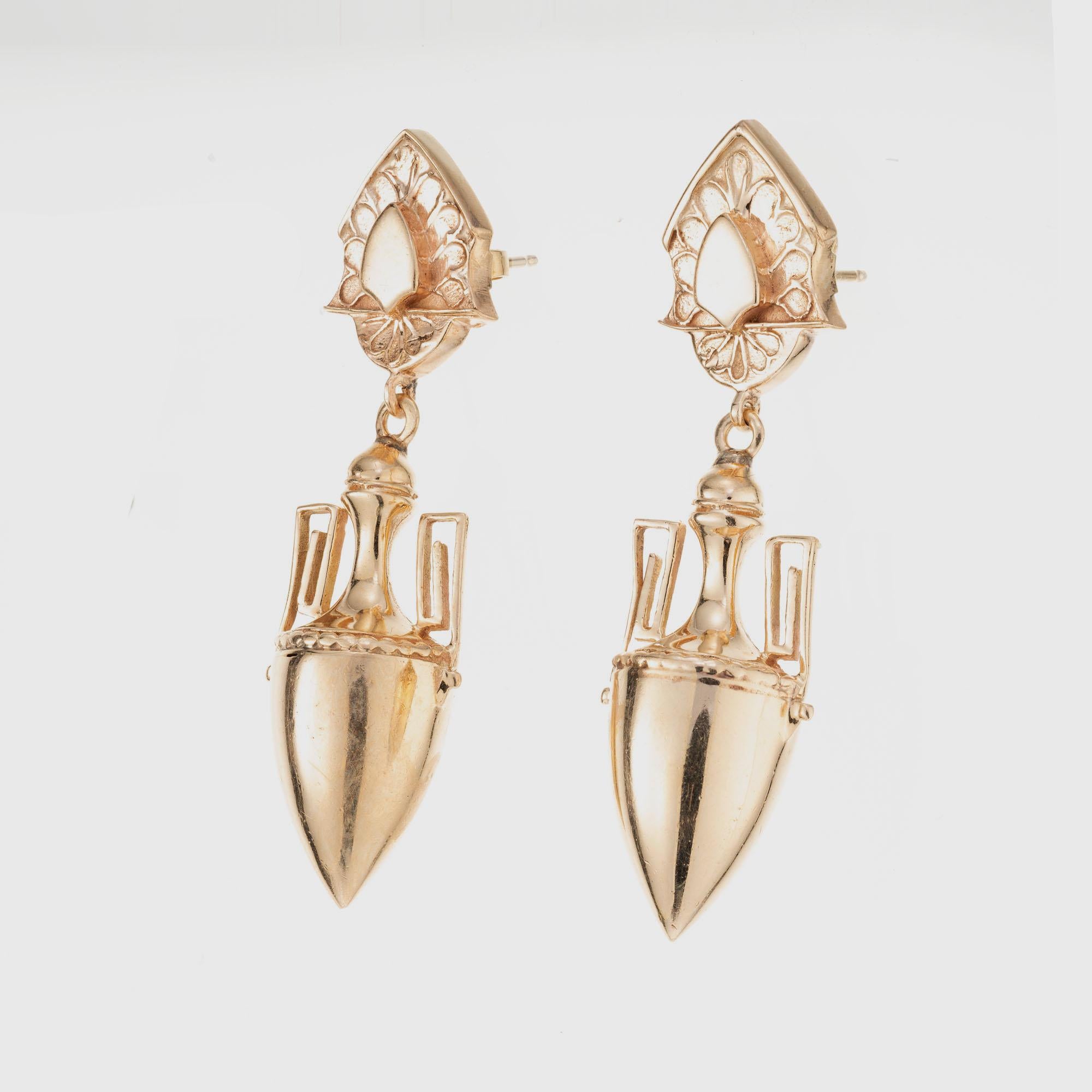 Etruscan revival late 1800’s dangle earrings in 14k rose and yello gold. 

14k rose gold 
14k yellow gold 
14.2 grams
Top to bottom: 47.4mm or 1 7/8 Inch
Width: 13.5mm or .5 Inch
Depth or thickness: 11.0mm


