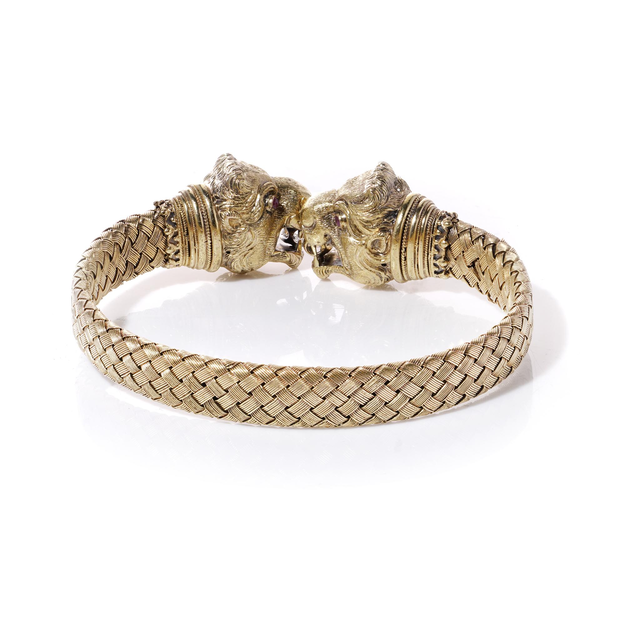 Etruscan revival 20kt. yellow gold double headed lion design cuff bracelet  1