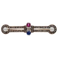 Etruscan Revival Diamond Ruby Sapphire Pearl Fibula Bar Brooch, circa 1900