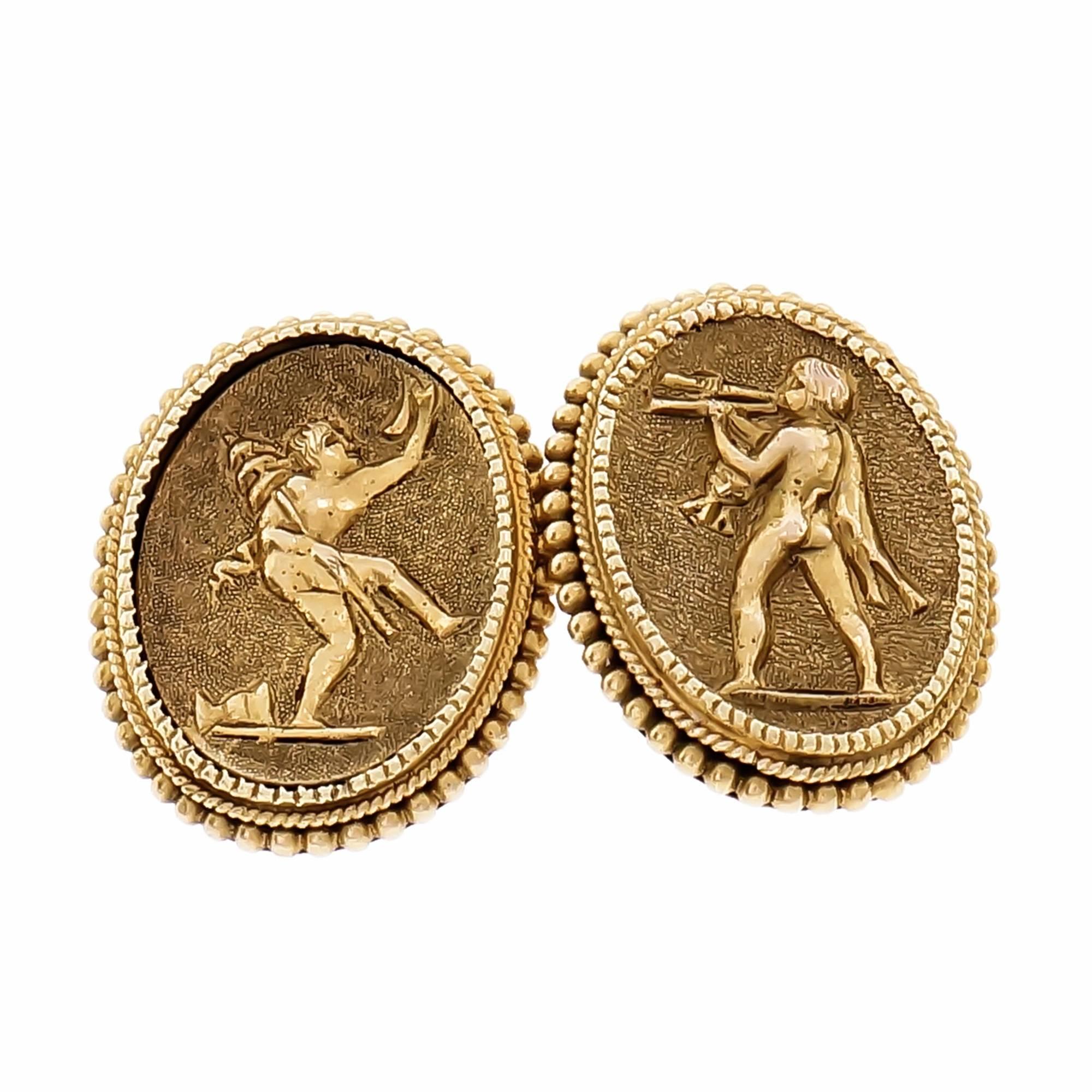 Vintage 1930s handmade Cufflinks. Engraved on both sides front and back 18k yellow gold, Etruscan Revival.

18k yellow gold
Tested and stamped: 18k
16.6 grams
Top to bottom: 17.26mm or .68 inch
Width: 13.9mm or .55 inch
Depth: 4.23mm

