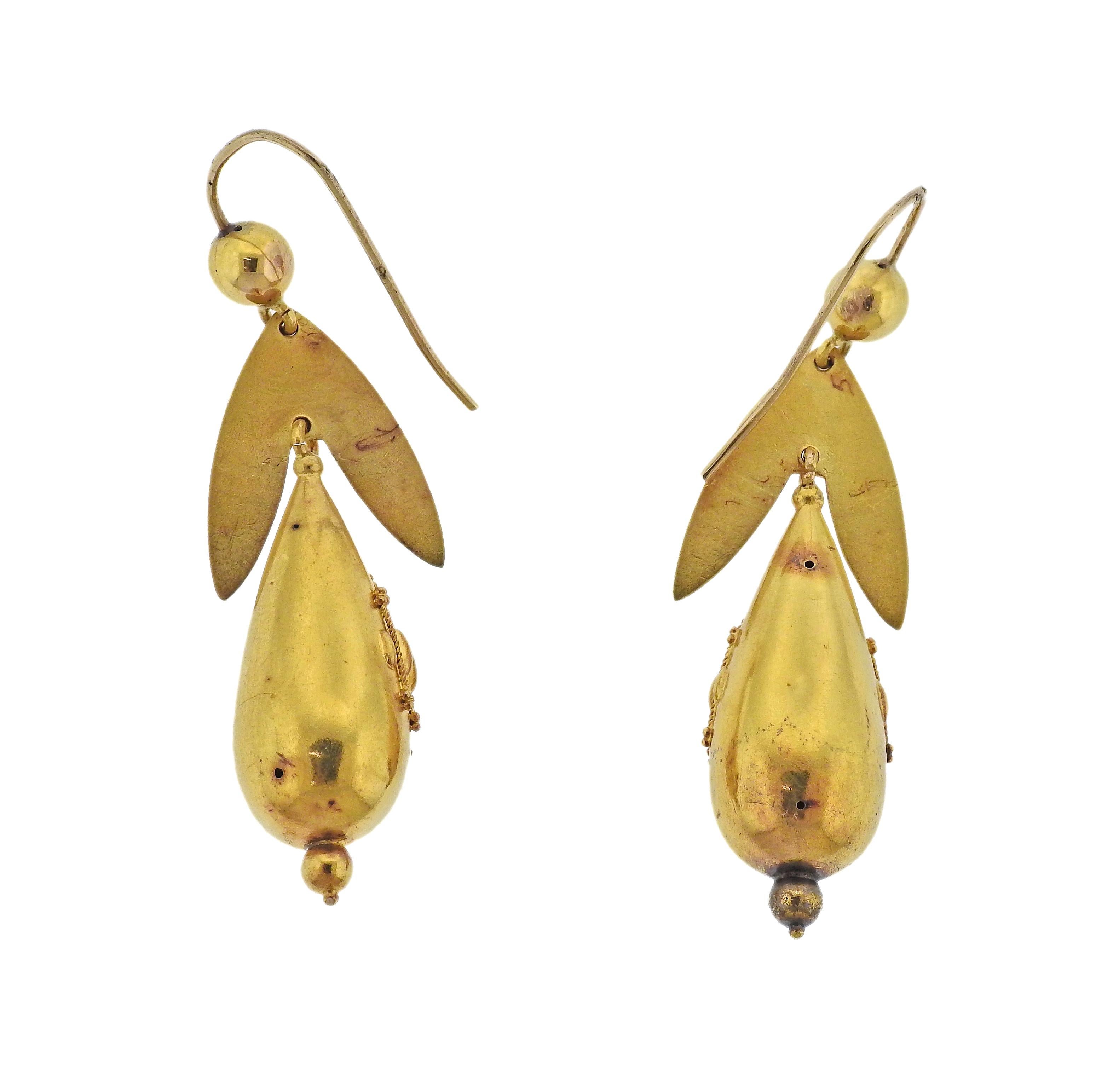 Pair of Etruscan Revival 14k gold drop earrings. Measuring 53mm x 16mm. Weight - 7.5 grams.