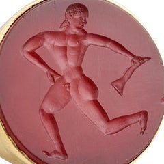 Etruscan Revival Gold Ring Set with a Carnelian Intaglio of a Running Athlete.