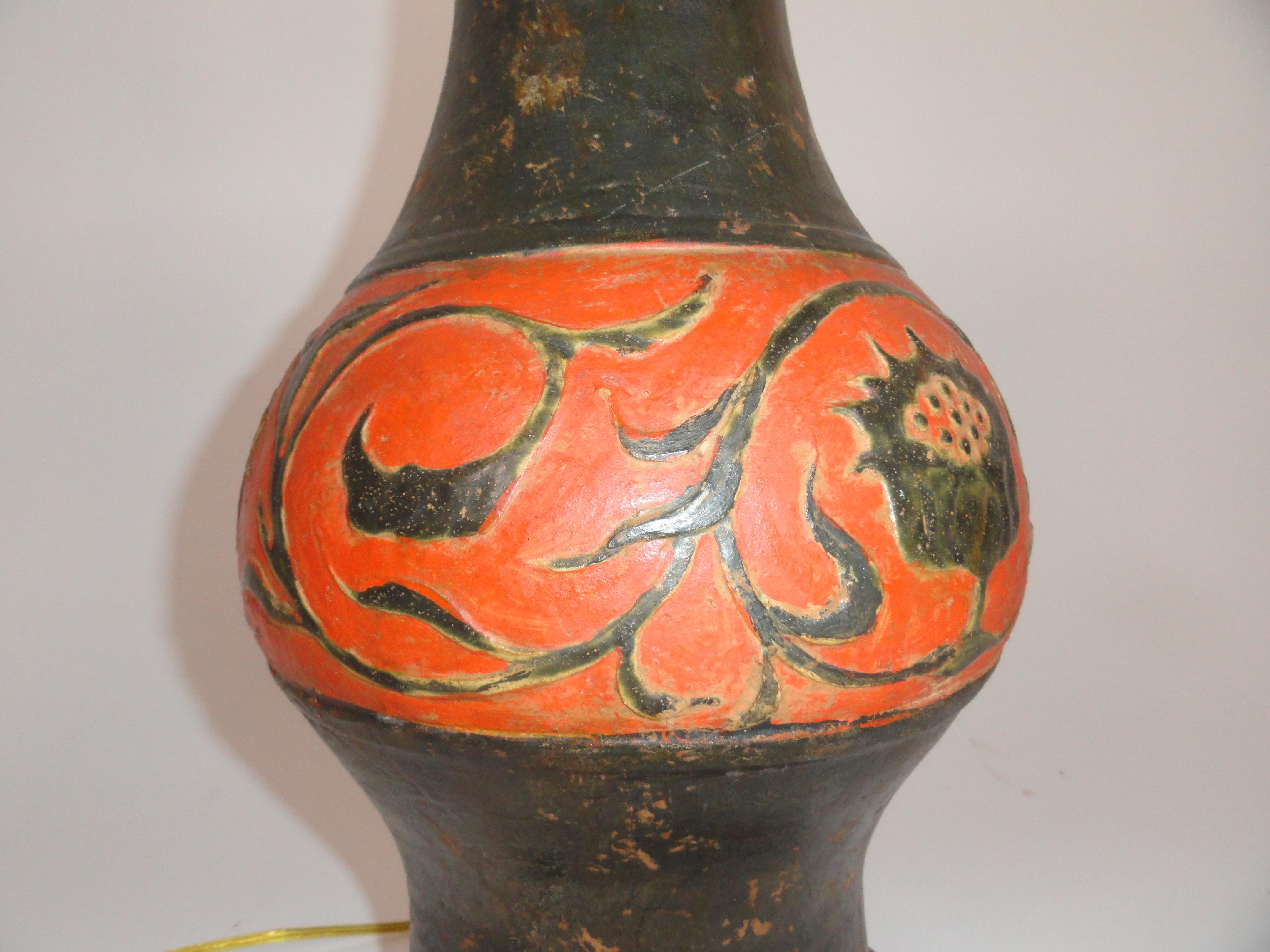 Etruscan style lamp. Ceramic vase lamp in the Etruscan taste with a naturally worn finish.
Measures 20.5