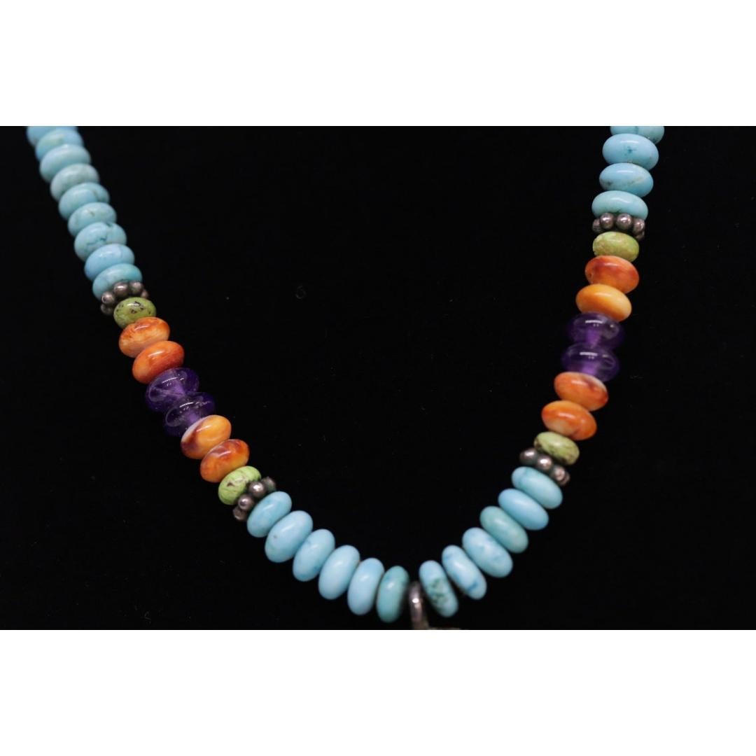 Donna Ciondolo con intarsio del sole in argento sterling di Etta Endito Navajo. Navajo sud-occidentale in vendita