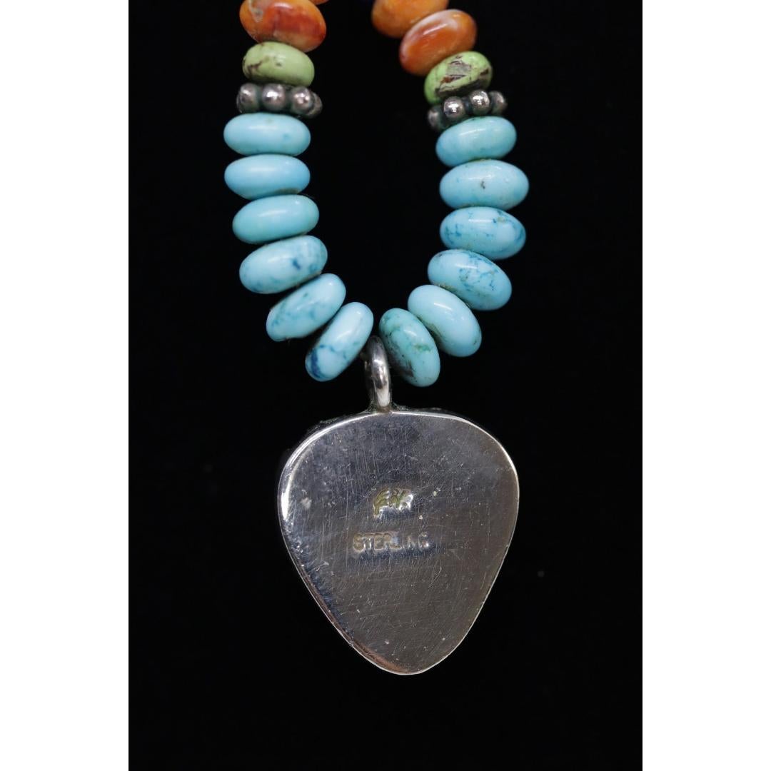 Ciondolo con intarsio del sole in argento sterling di Etta Endito Navajo. Navajo sud-occidentale in vendita 1