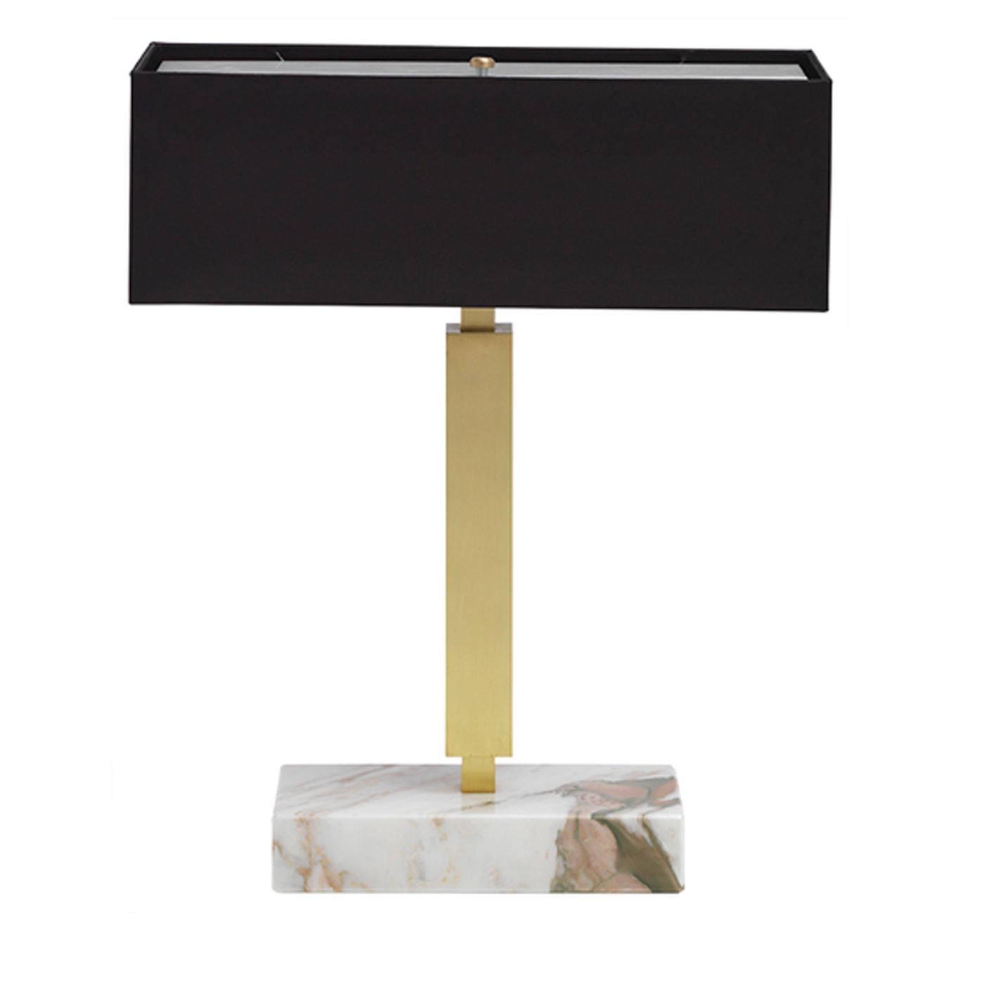 Exuding pure luxury, the Ettore rectangular table lamp sets the tone in a contemporary lounge space, either at home or in a hotel. On a Calcatta gold marble base, the lamp features a brass stem with a satin finish and a black rectangular shade for a