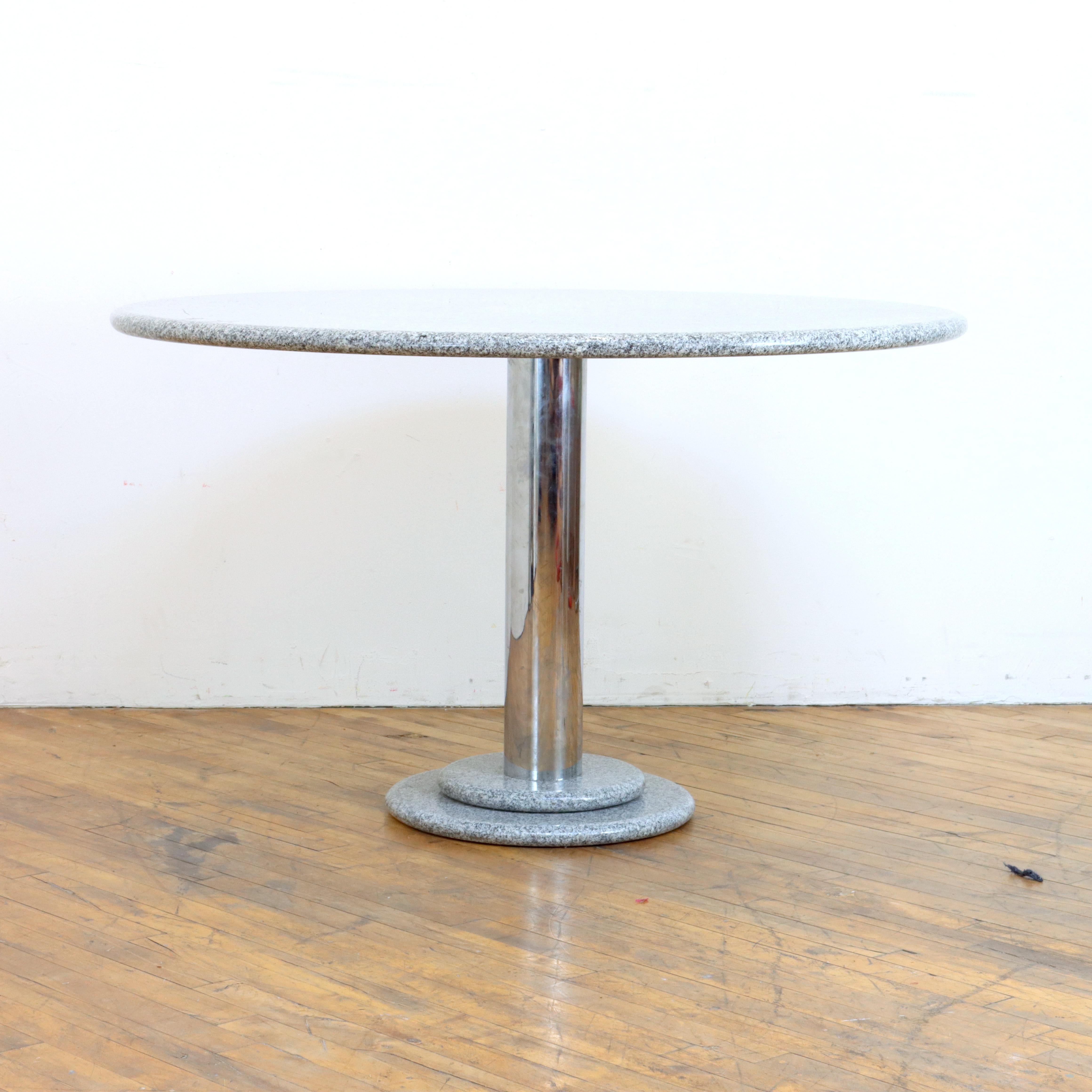 Add a playful touch to your kitchen with this 1980s postmodern Italian granite and chrome dining table after Ettore Sottsass, 
similar to his 